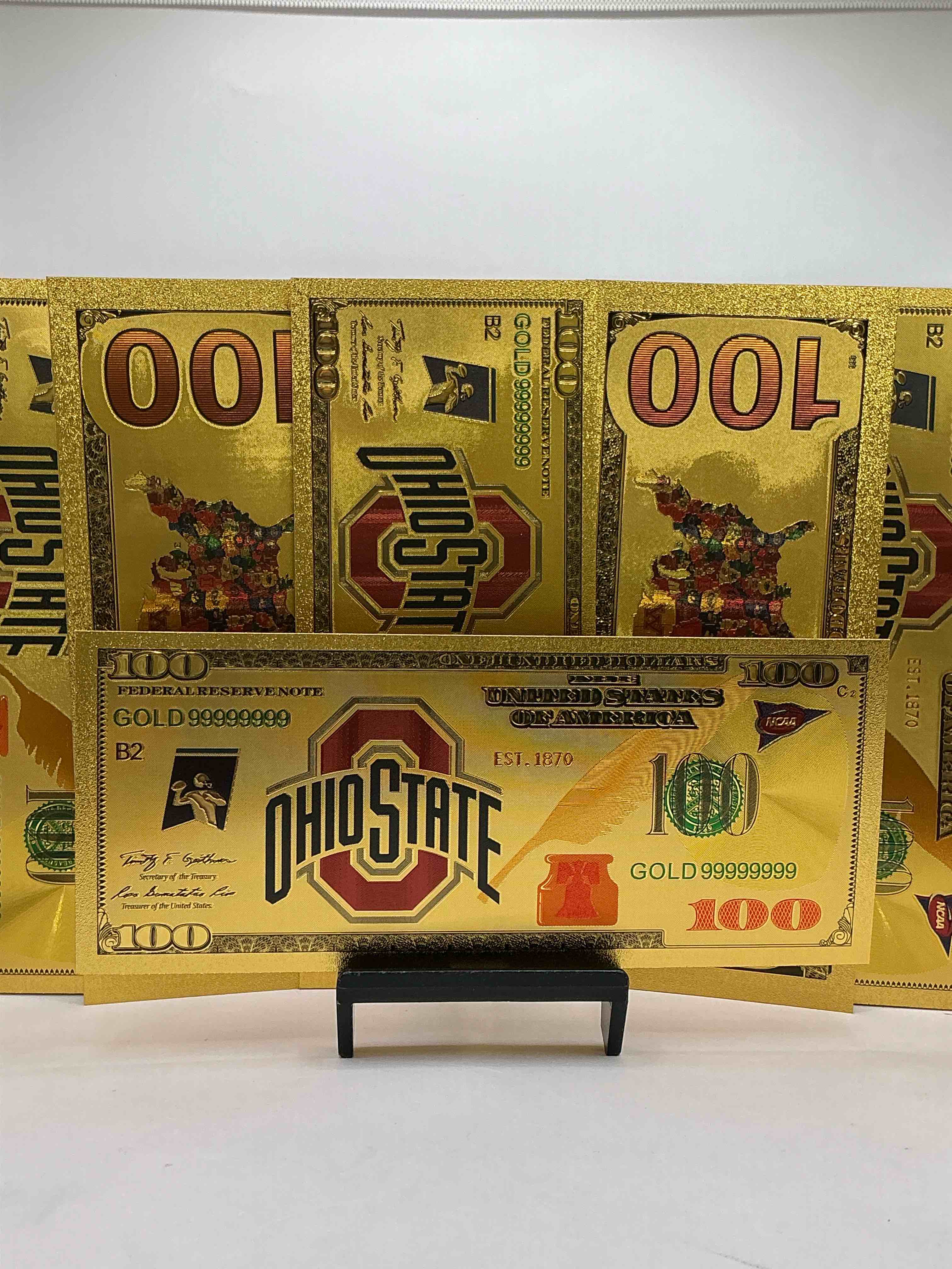 ohio state university collectible memorabilia! super cool, gold in color 100 dollar commemorative ohio state university bill! cool designs on front & back of bill! osu fans rejoice, cool memorabilia! plastic bills with cool designs! 