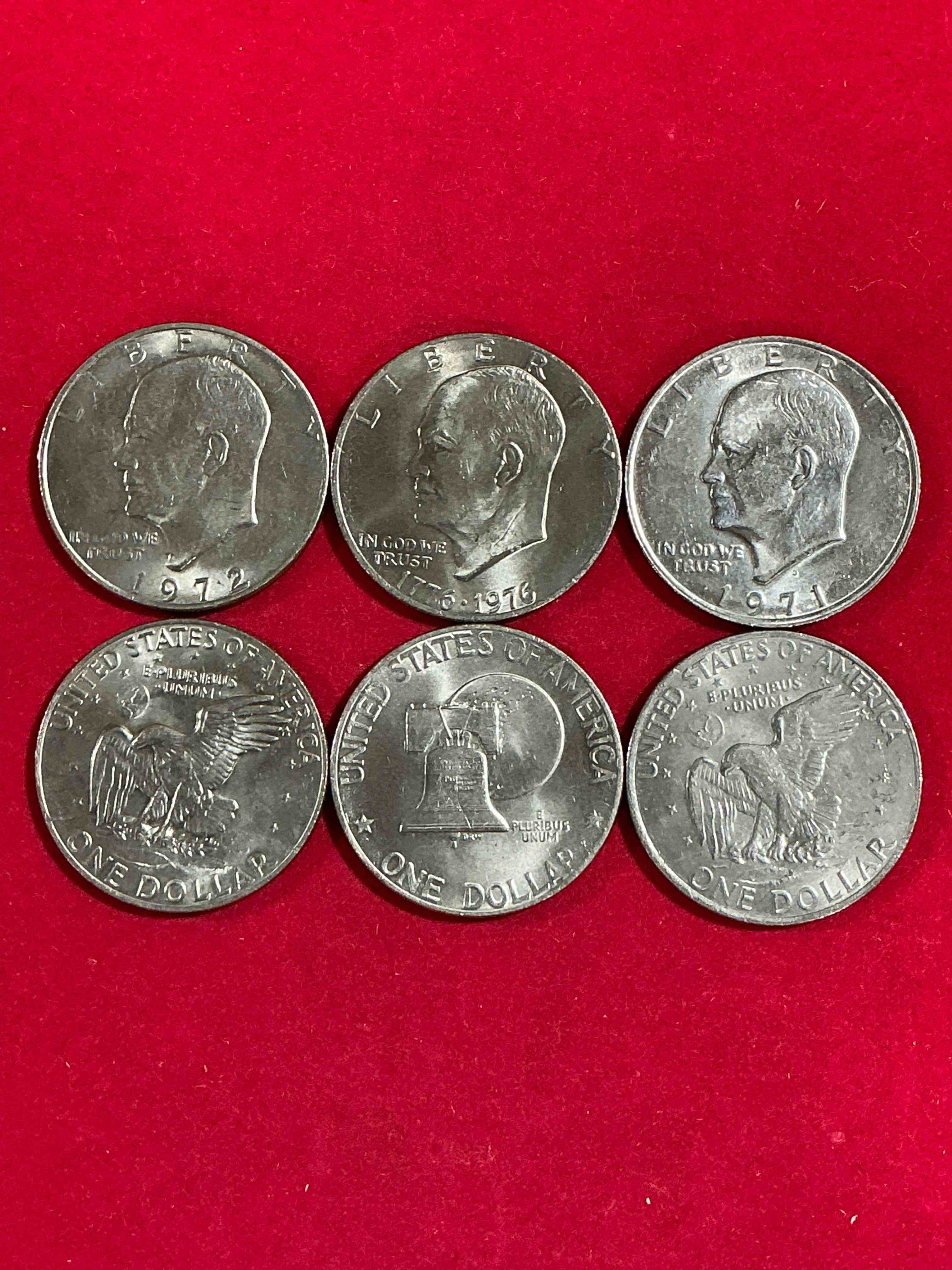 eisenhower dollars! here’s six circulated “ike” dollars! up for auction are ike one dollar coins from different years! 1976! awesome ike dollars!