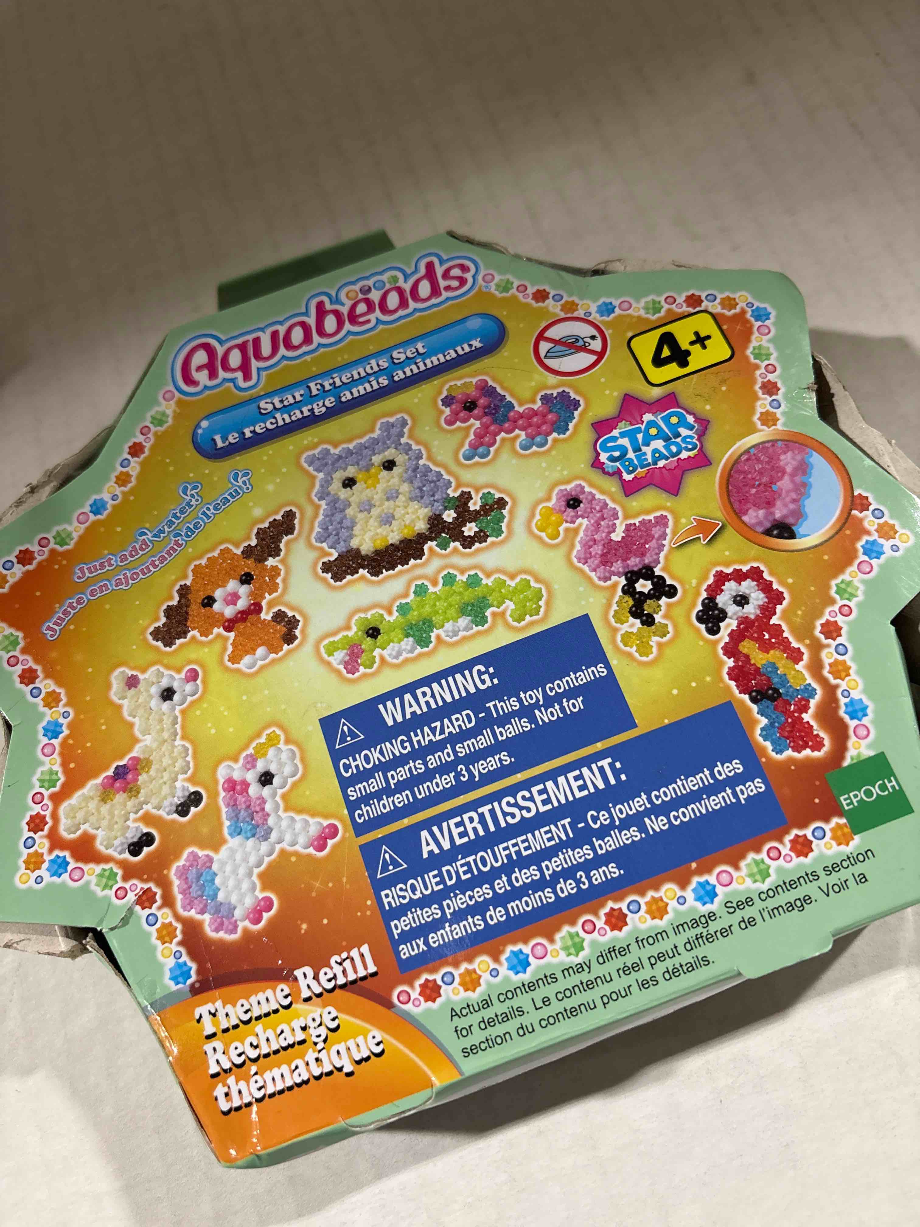 Condition photo showing New/Like New for Aquabeads Arts & Crafts Star Friends Theme Bead Refill with Over 600 Beads and Templates, Multicolored