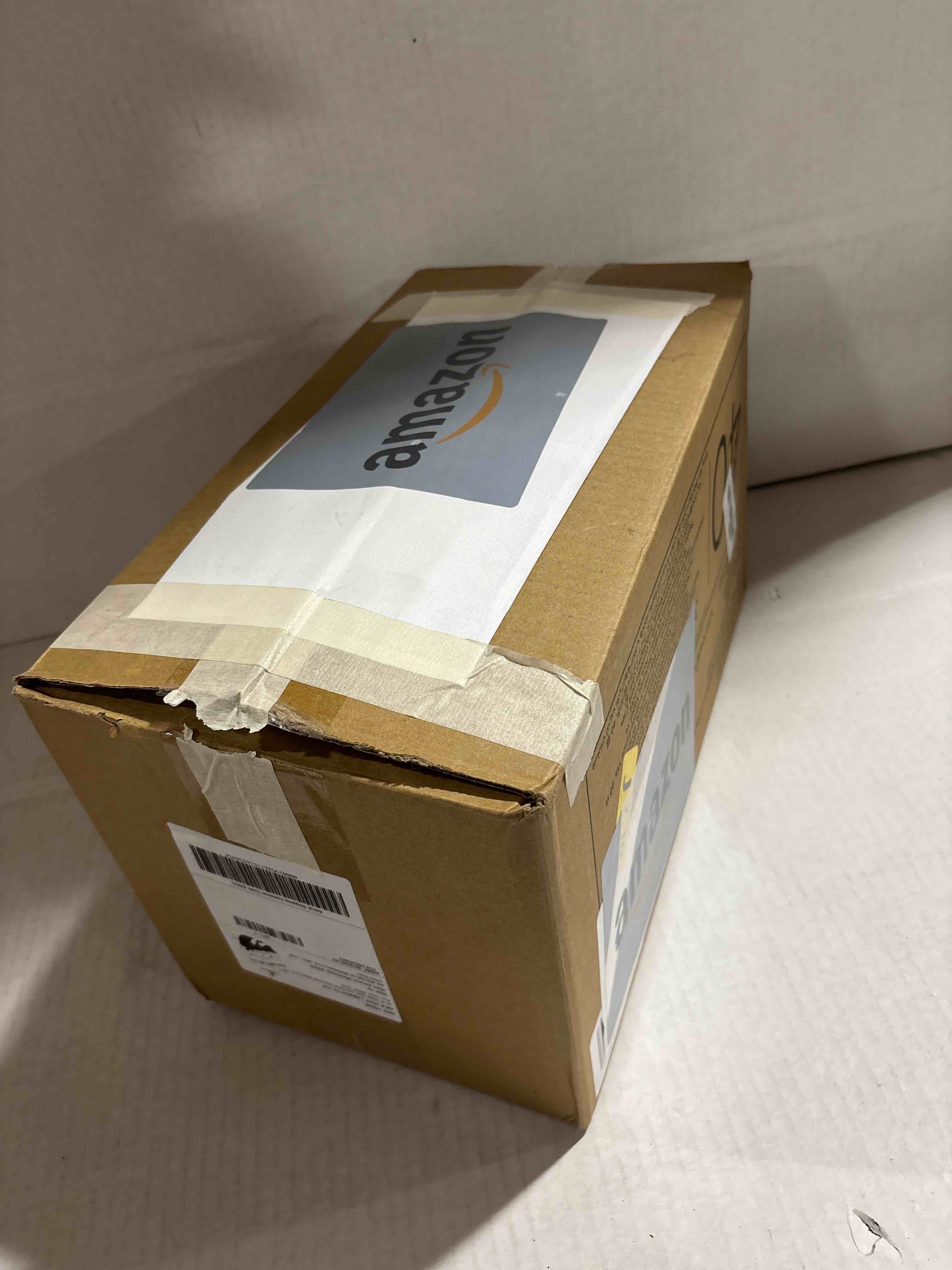 Condition photo showing New/Like New for Amazon Basics Puppy Pads with Quick-Dry 5-Layer Leak-Proof Design for Potty Training, X-Large Size 28 x 34 Inch, Pack of 40, Blue & White X-Large (40 Count)