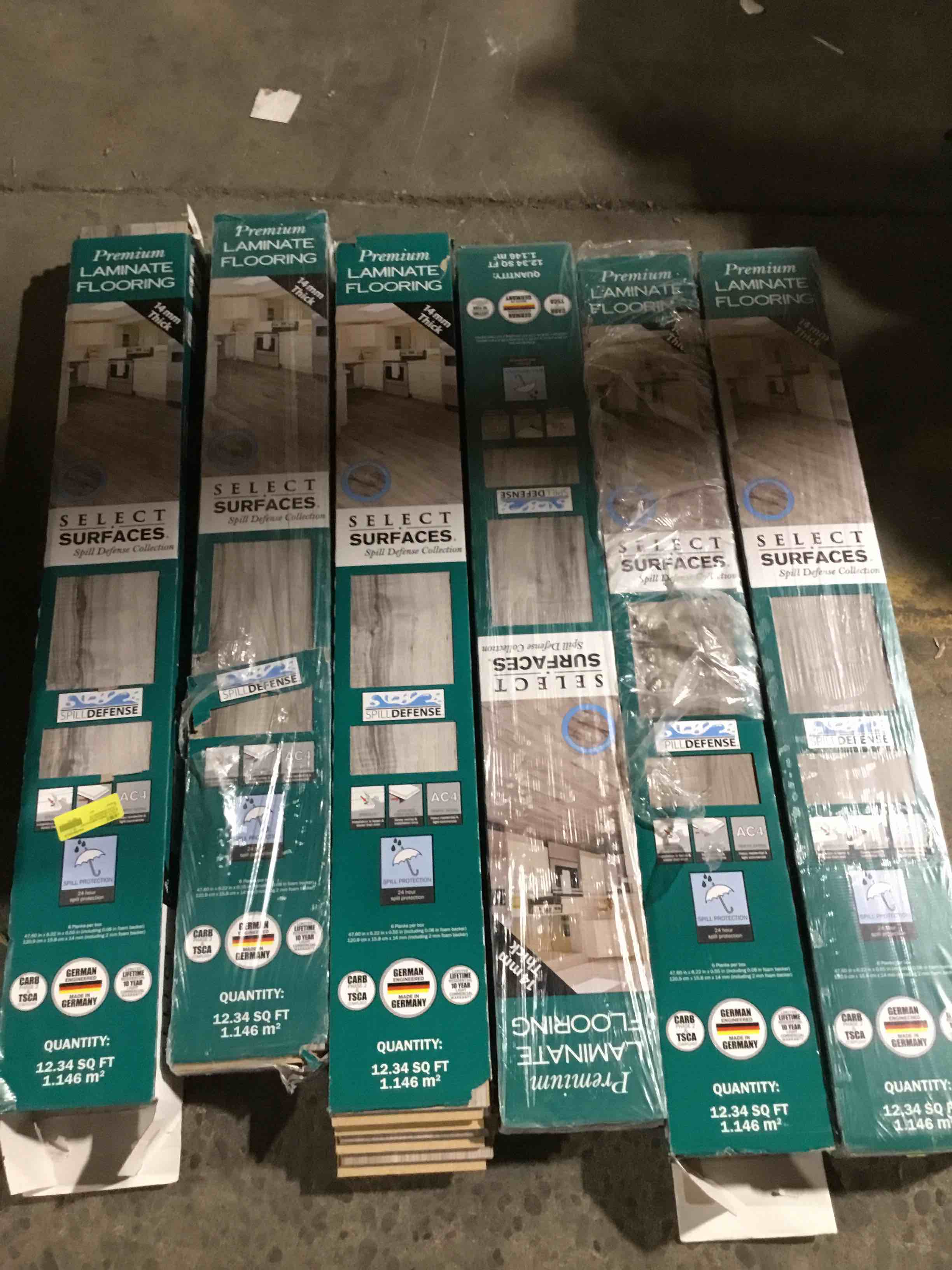 Select Surfaces™ Southern Gray SpillDefense™ Laminate flooring features a beautiful blend of warm and cool gray tones that will complement almost any wall color