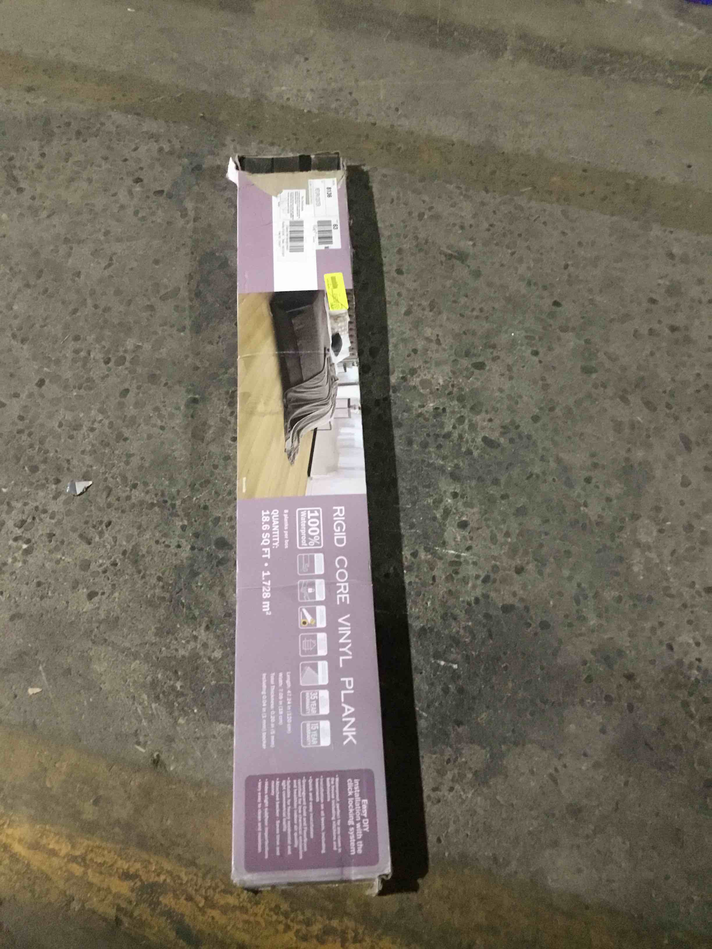 Select Surfaces®’ Riverside rigid core vinyl flooring features a light, natural oak hue with warm beige tones and soft, creamy undertones, enhanced by subtle wood grain detailing