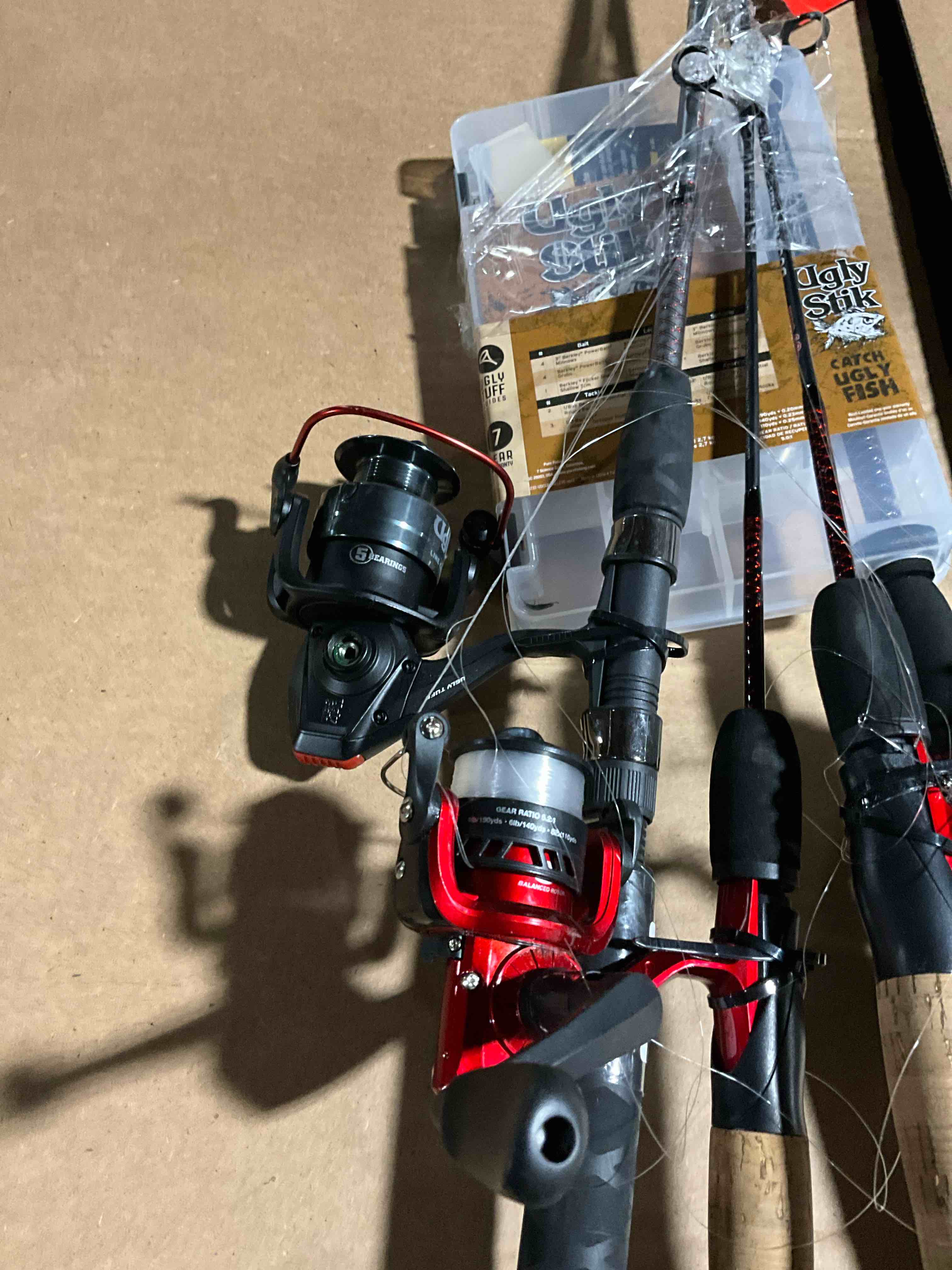 Condition photo showing As Is for Assortment of 4 Fishing Reel & Rod Combo 