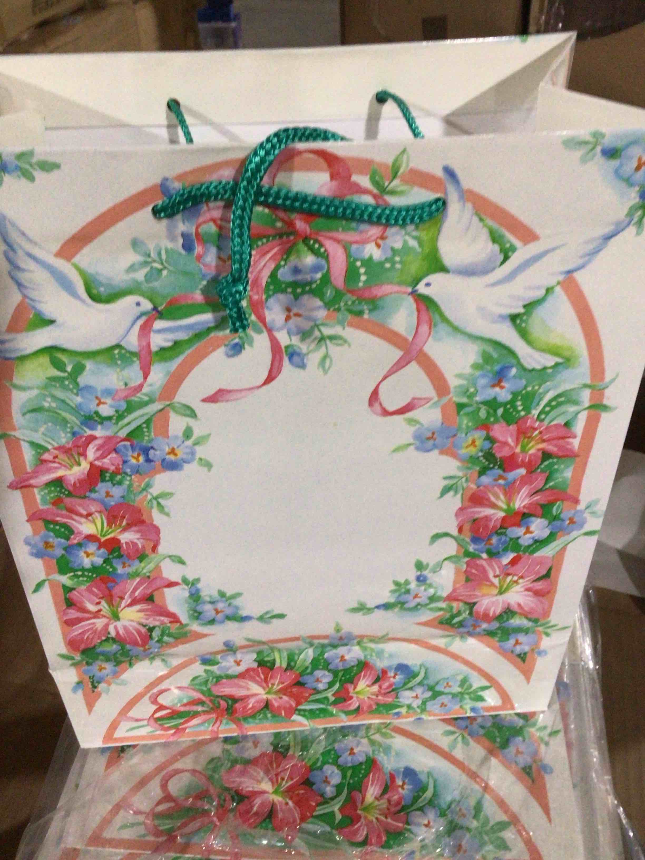 gift bag with floral des and pigeon 