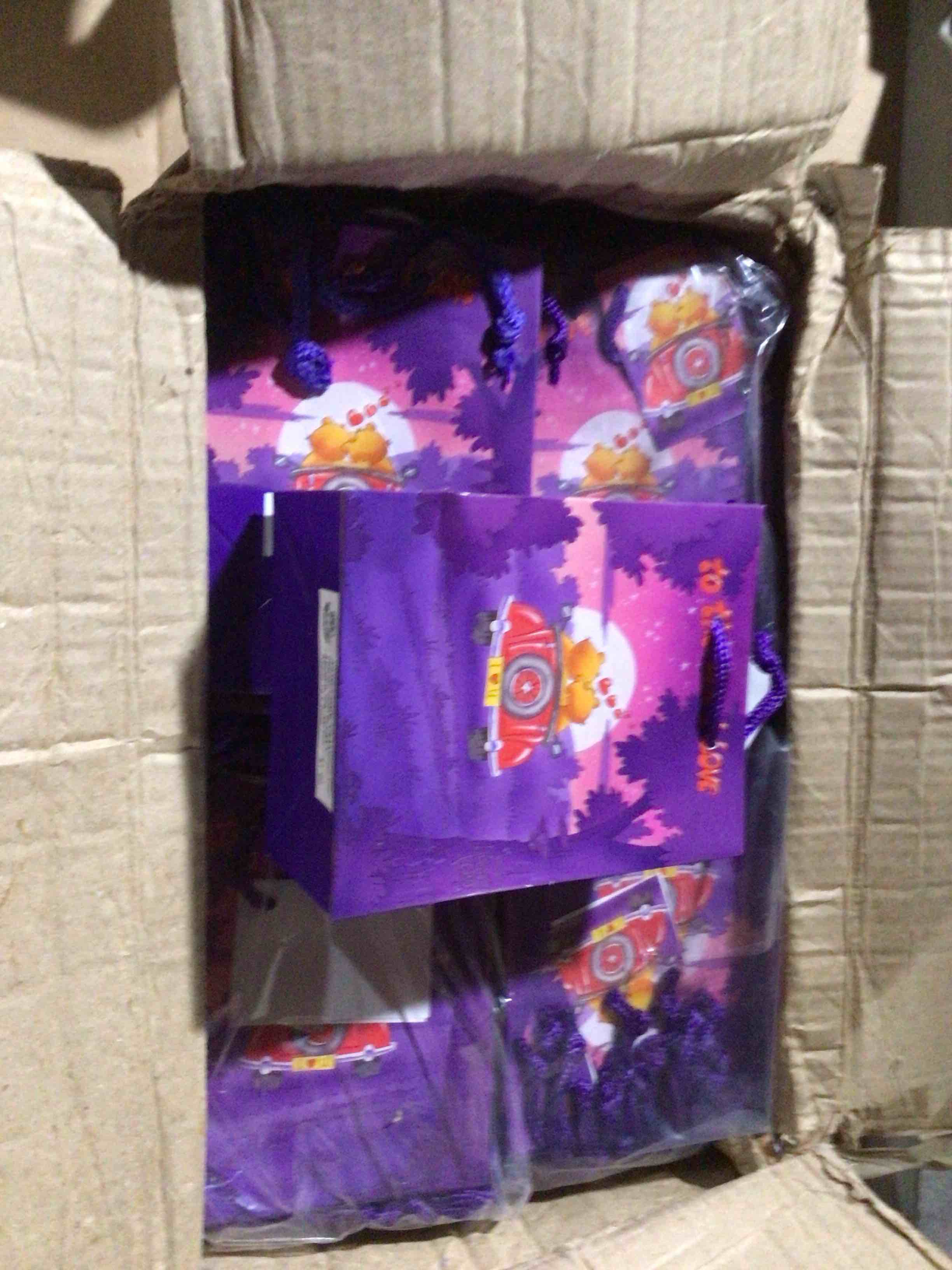 purple gift with bear design 