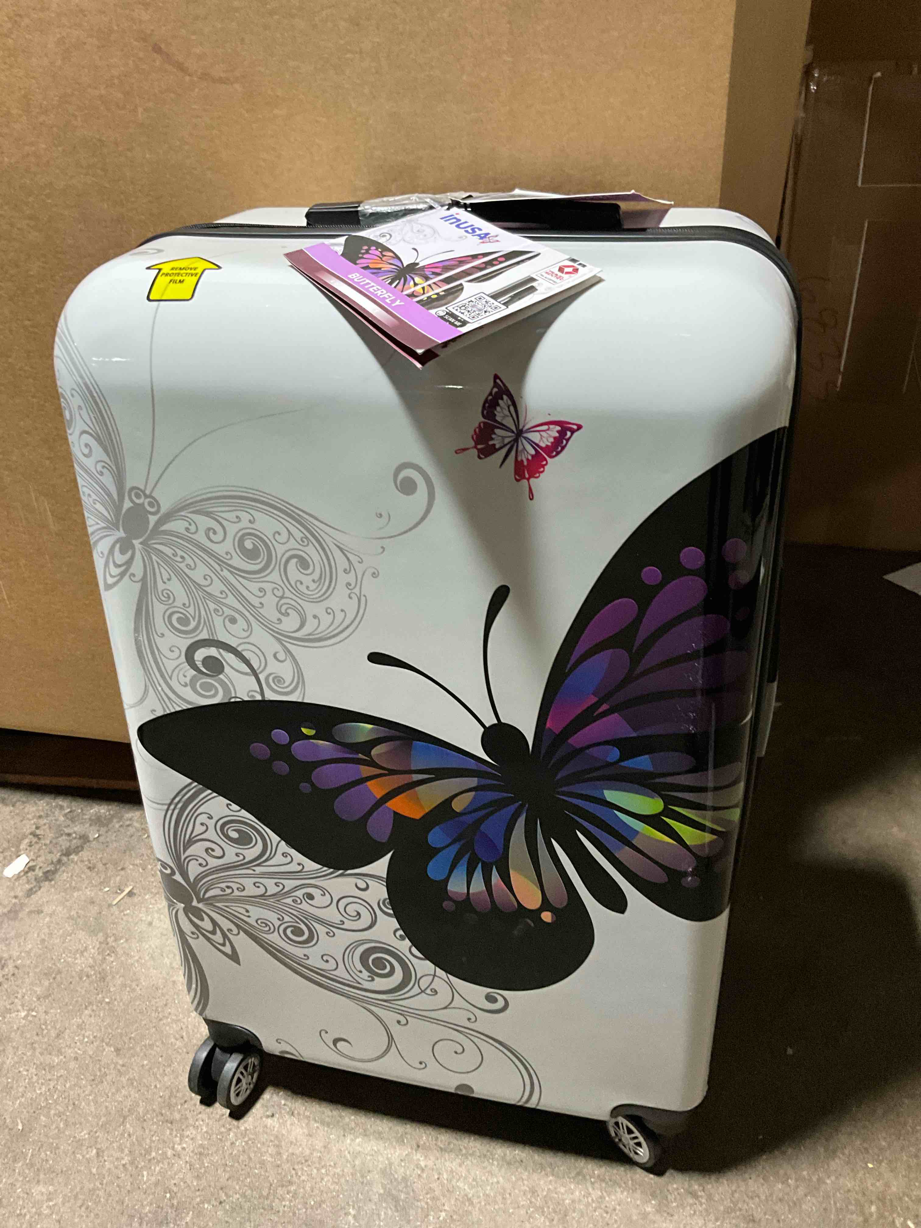 Condition photo showing New/Like New for InUSA Lightweight Hardside Large Checked Spinner Suitcase - Butterfly