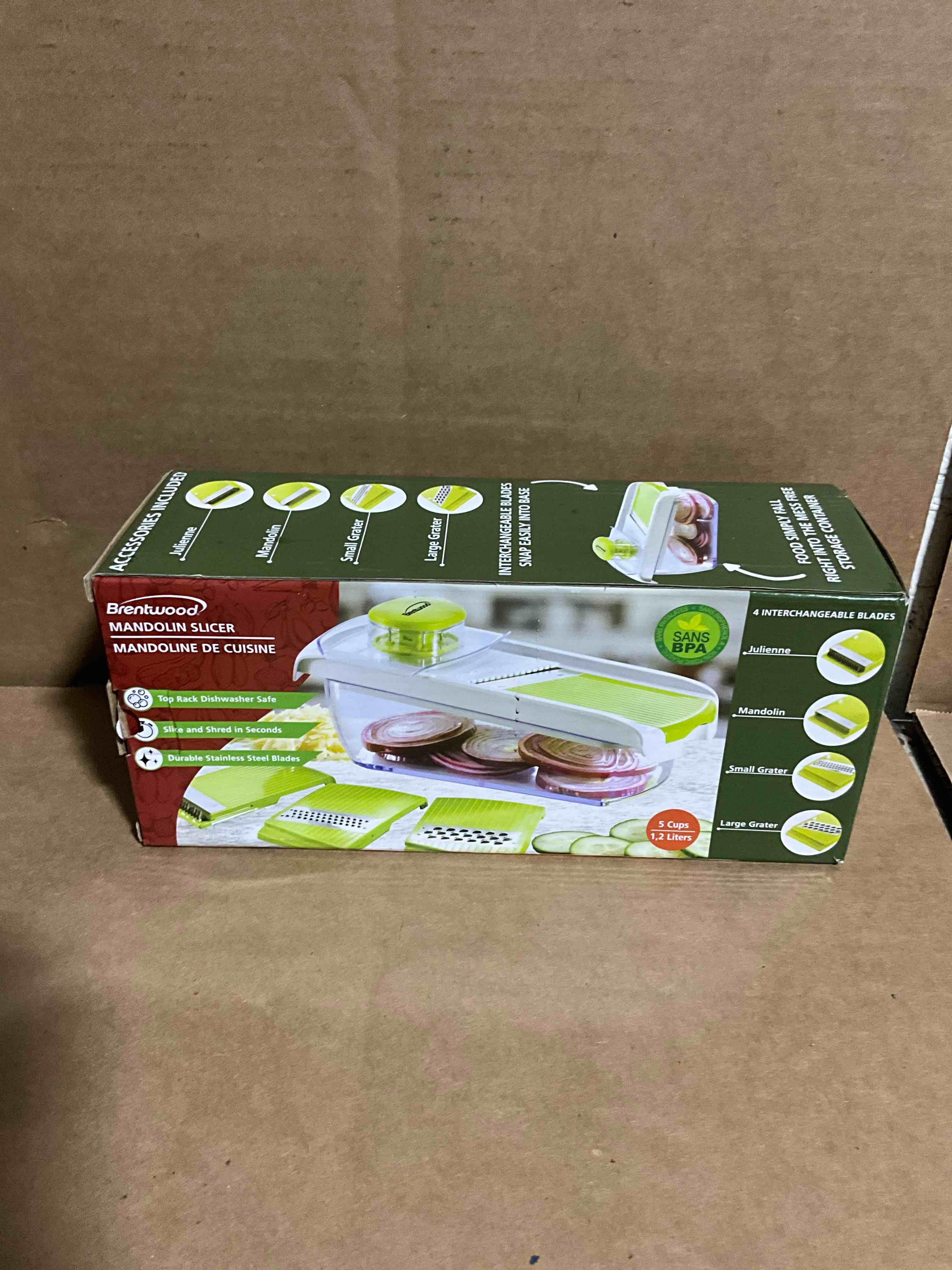 Condition photo showing New/Like New for Brentwood Mandolin Slicer with 5 Cup Storage Container and 4 Interchangeable Stainless Steel Blades in Green