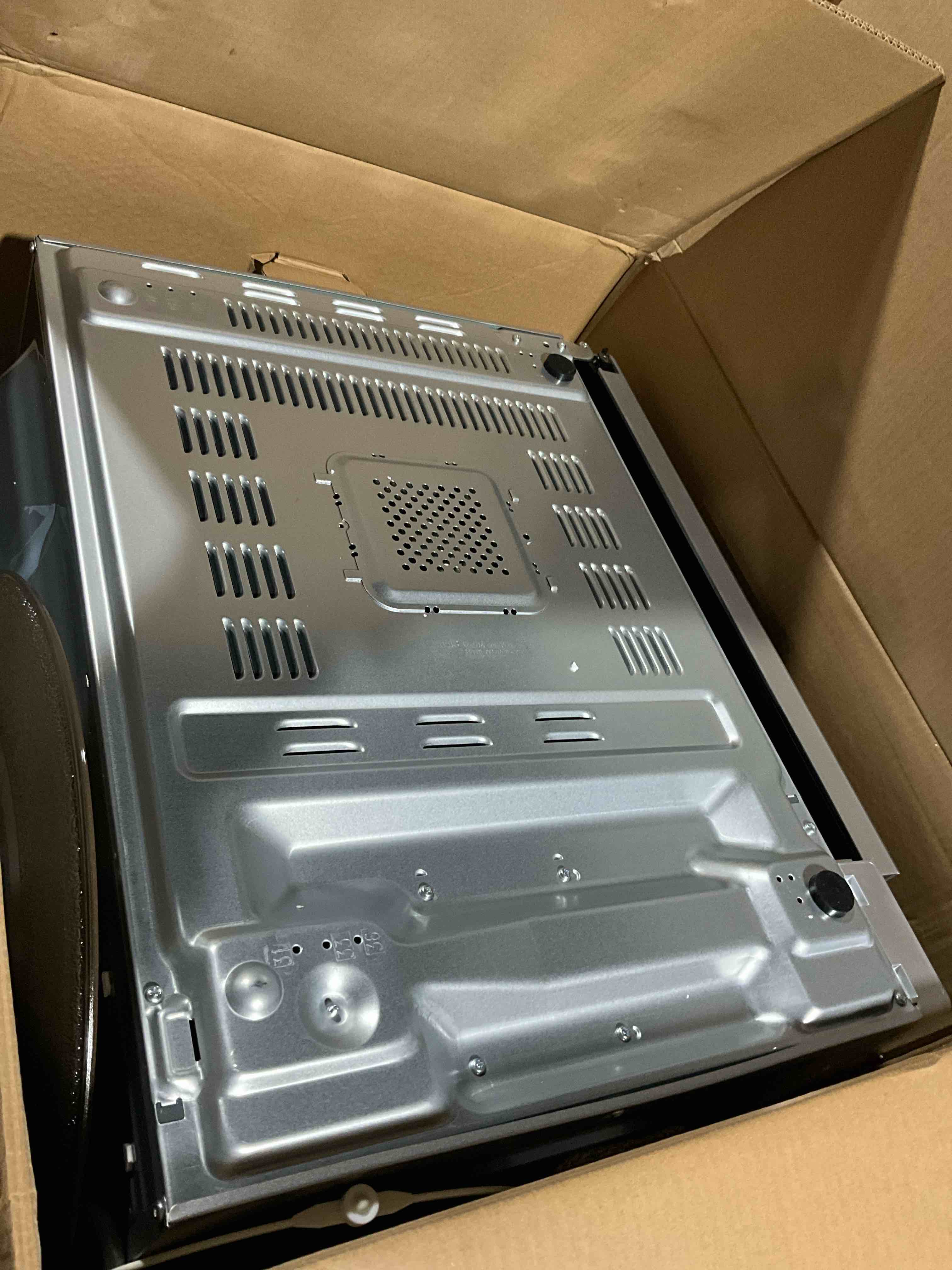 Condition photo showing As Is for Sharp 2.2 cu ft Countertop Microwave Ovens in Stainless