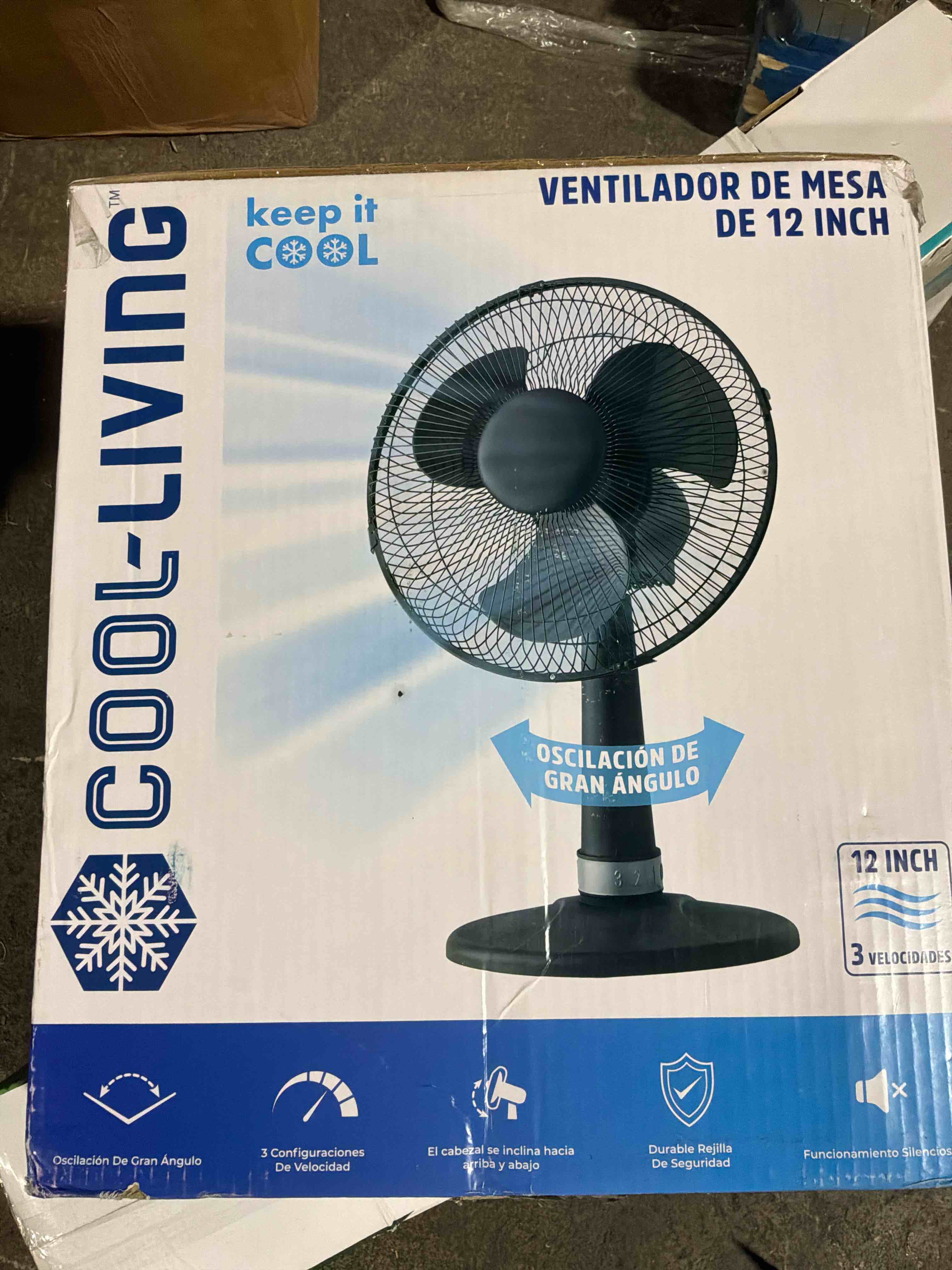 Condition photo showing New/Like New for cool living 12 inch table fan 