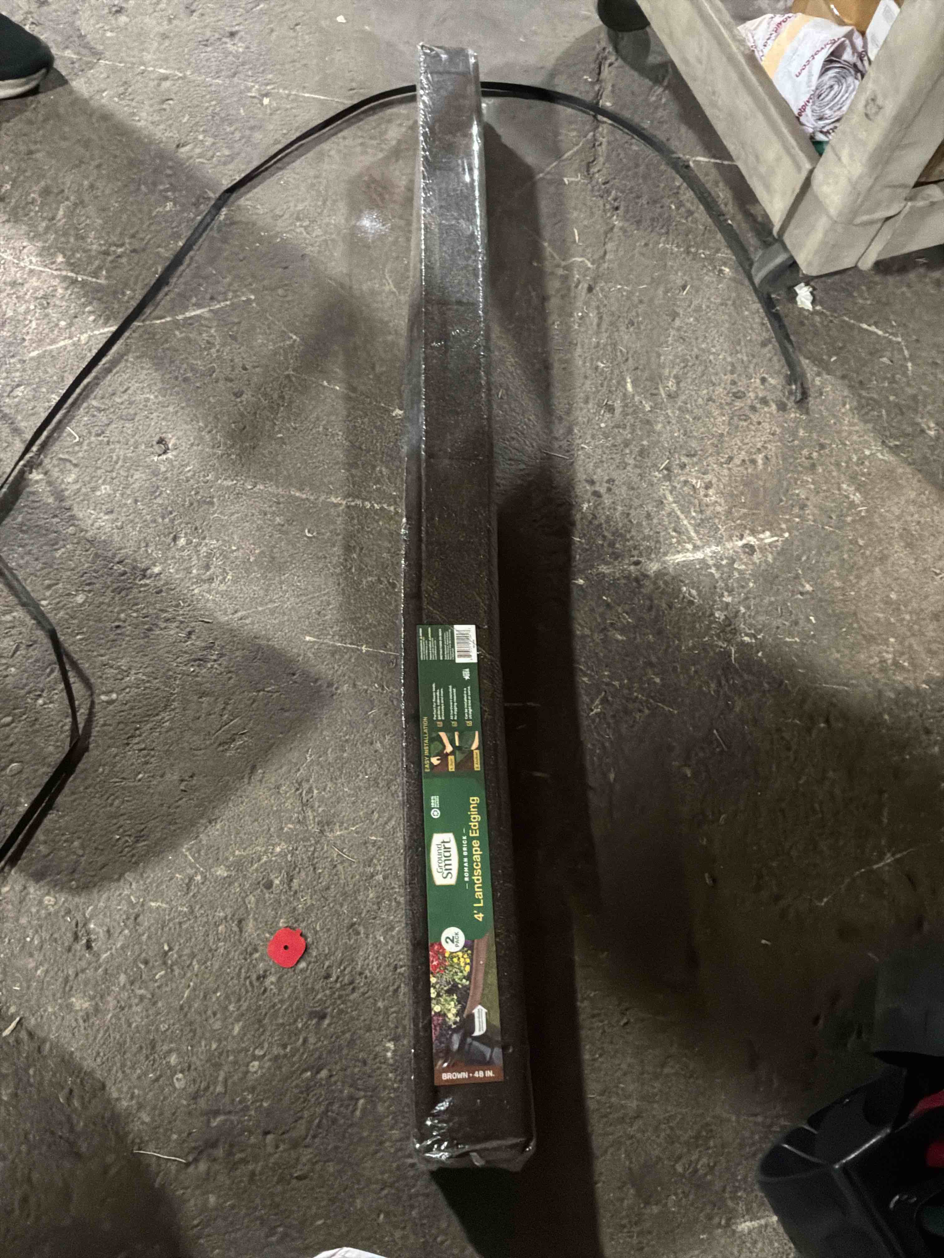 Condition photo showing Good Condition for groundsmart 4' brown roman brick rubber landscape edging, 2pk