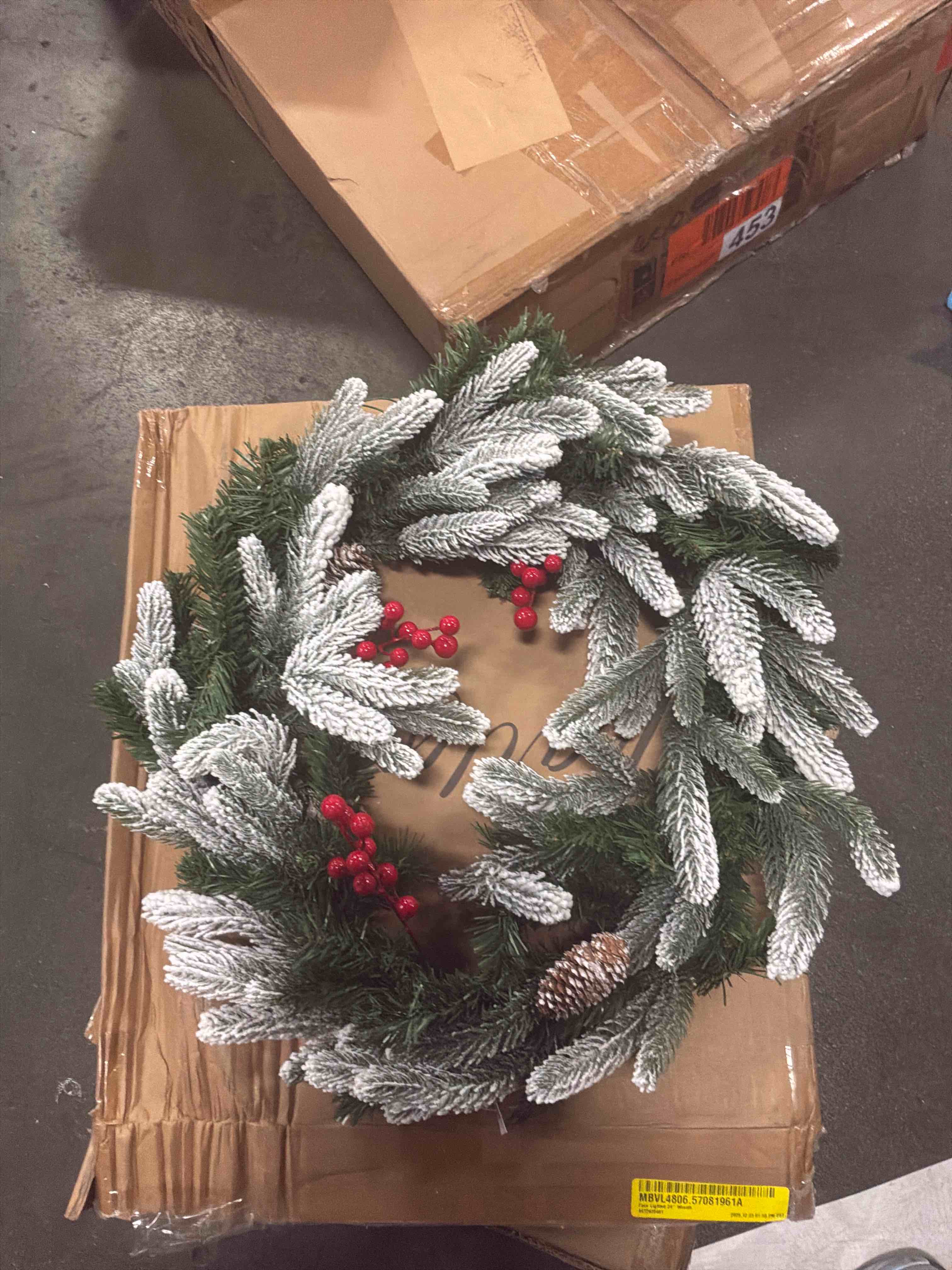 Condition photo showing New/Like New for faux lighted 24” wreath