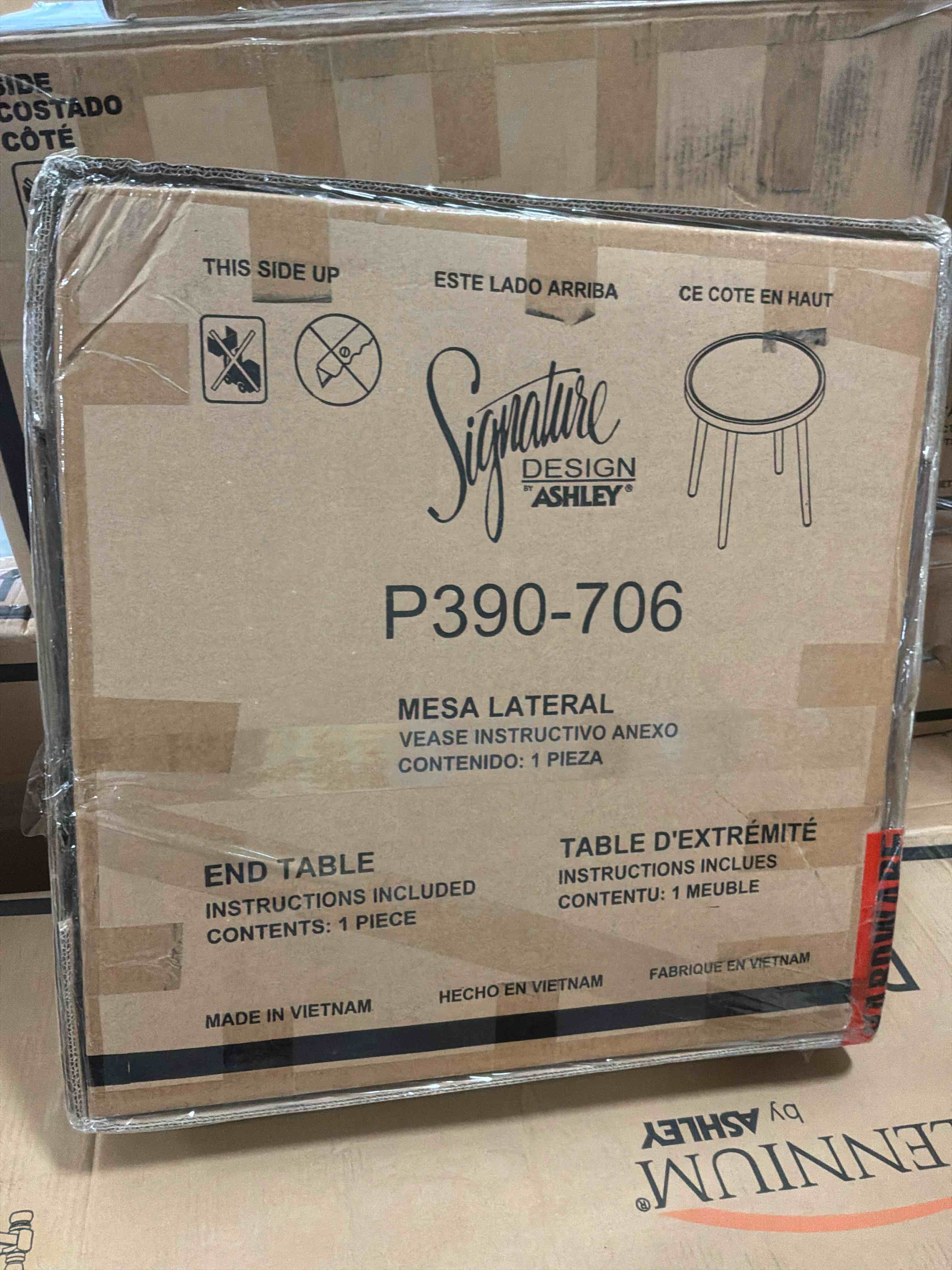 Condition photo showing New/Like New for signature design casual swiss valley outdoor end table beige