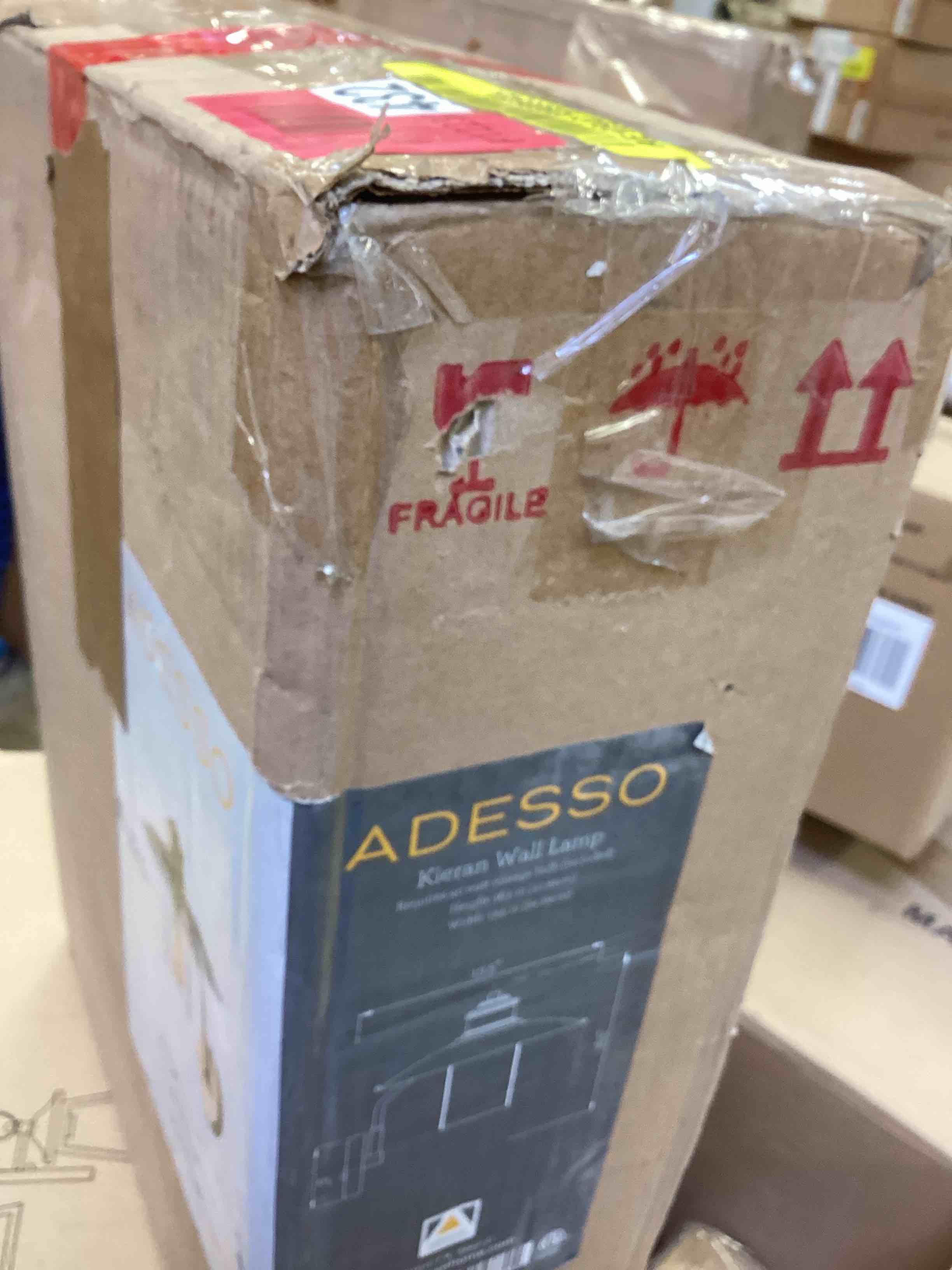 Condition photo showing New/Like New for brass kieran wall light by adesso