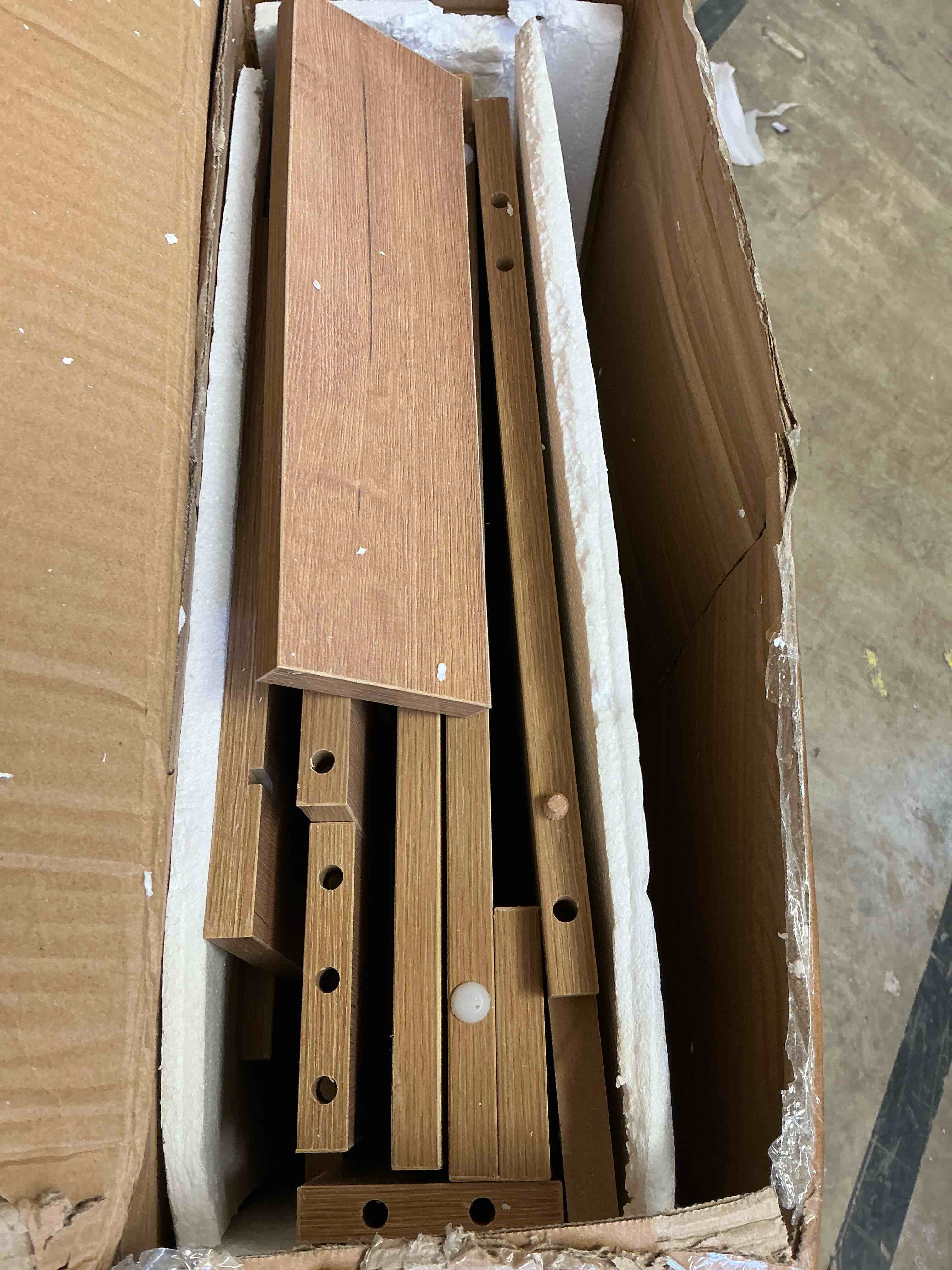Condition photo showing As Is for 24.0 in. bath vanity cabinet without top in imitative oak unassembled