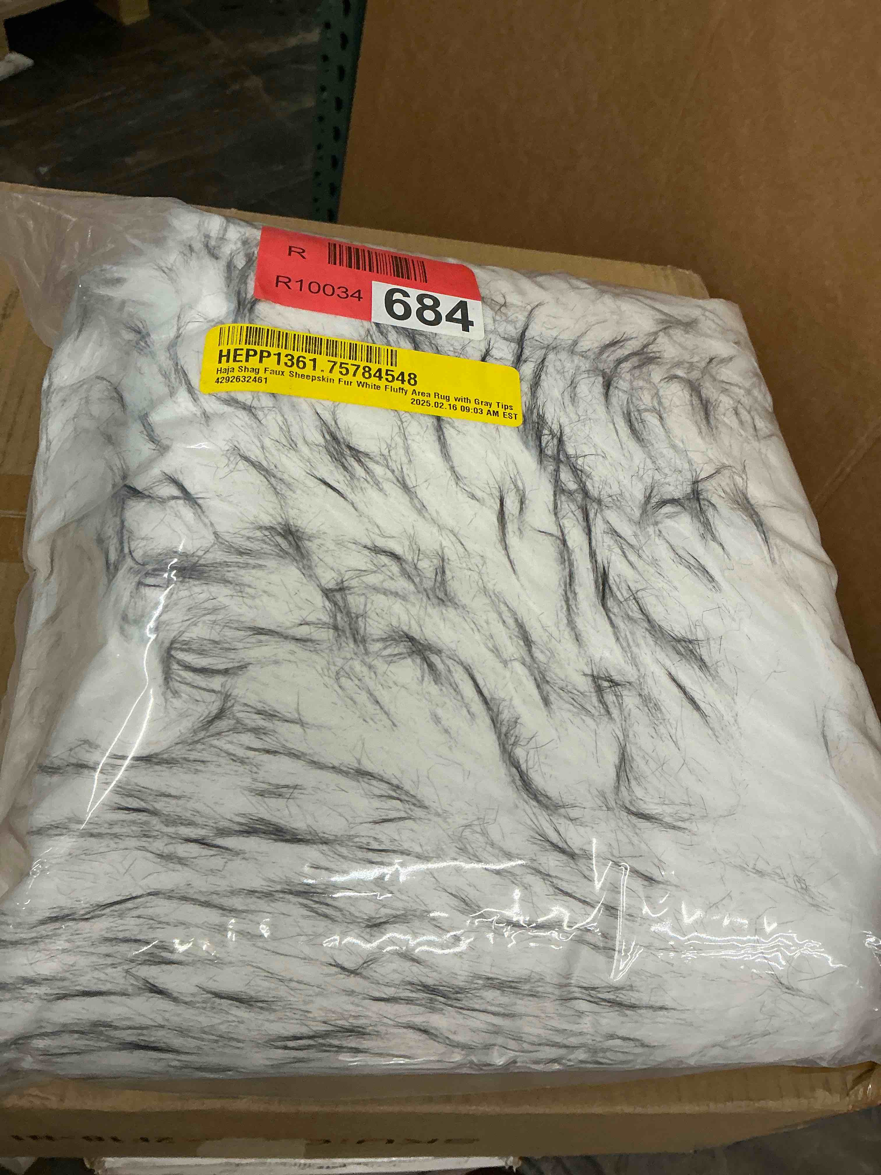 Condition photo showing New/Like New for haja shag faux sheepskin fur white fluffy area rug with gray tips
