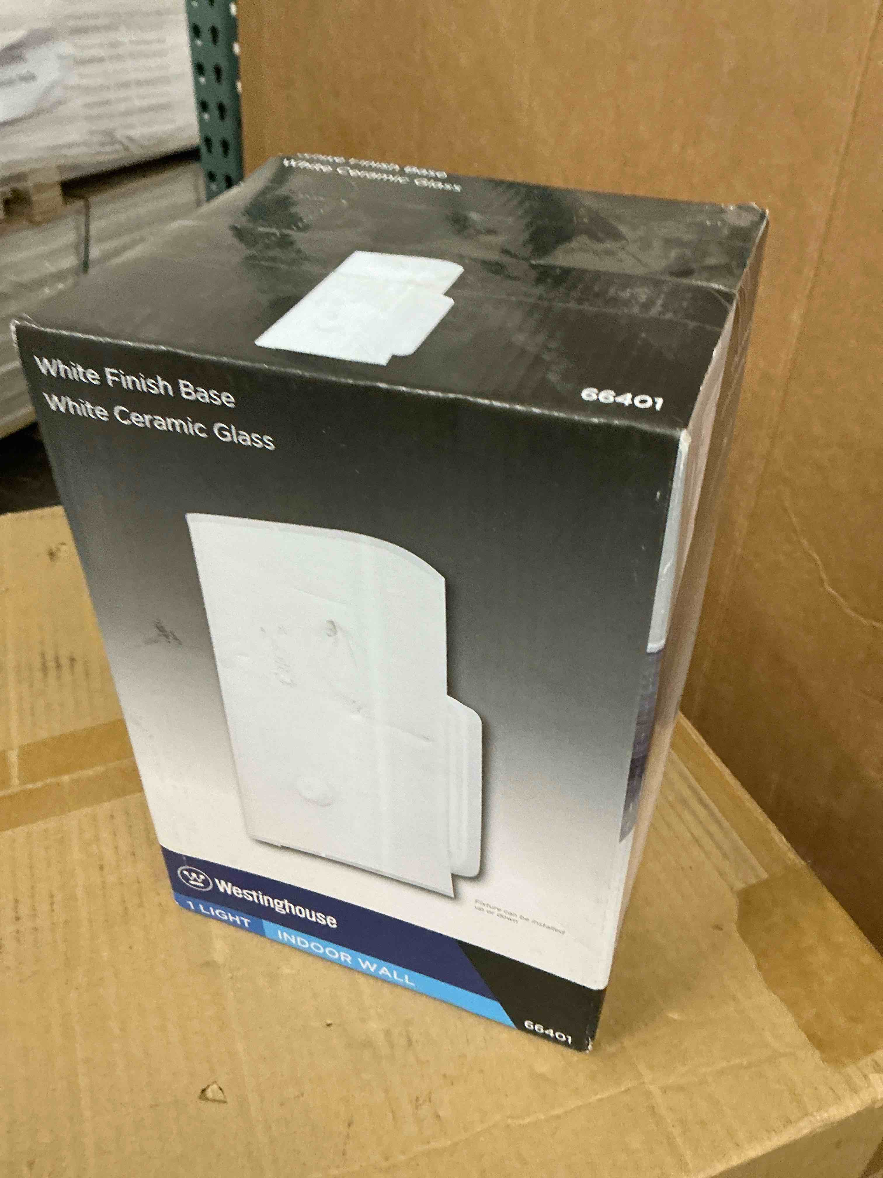 Condition photo showing New/Like New for westinghouse 1 light wall fixture white finish base white ceramic glass