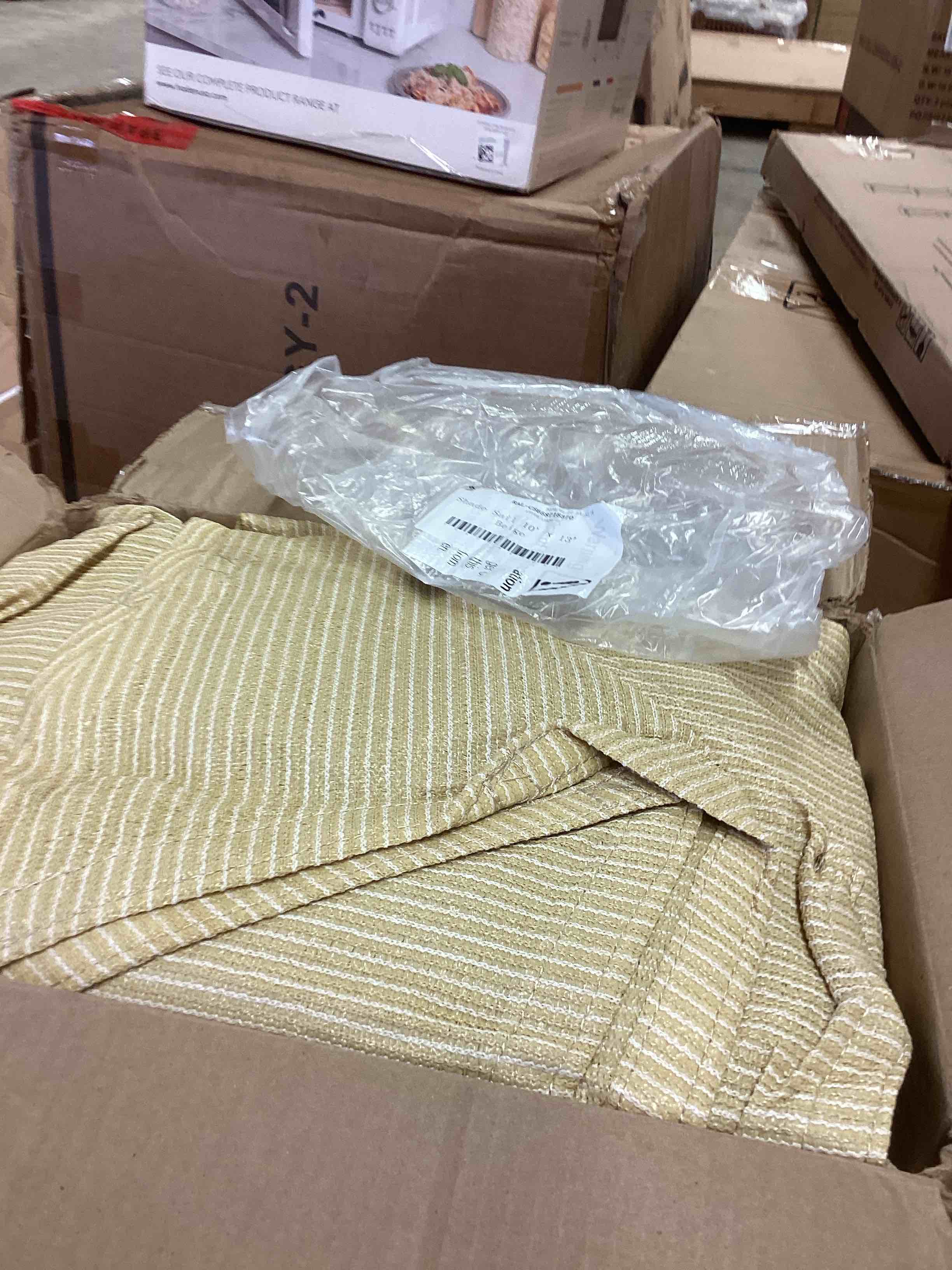 Condition photo showing New/Like New for shade sail 10’ x 13’ ,beige