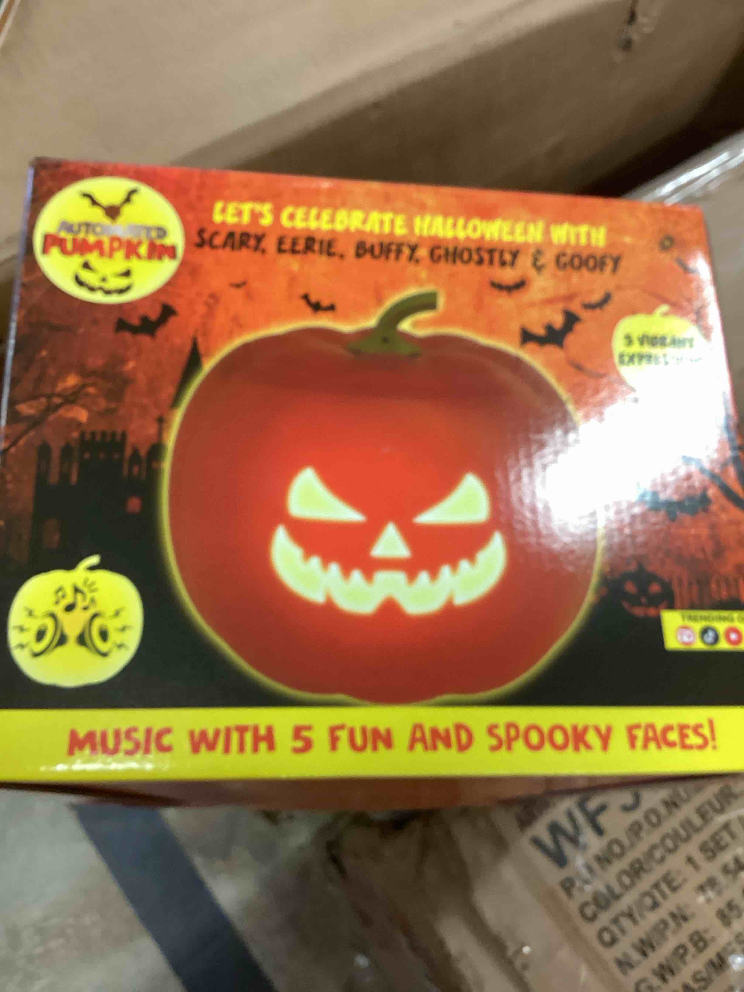 Condition photo showing As Is for animated pumpkin with 5 different spooky faces, built-in speakers, leds, new nib