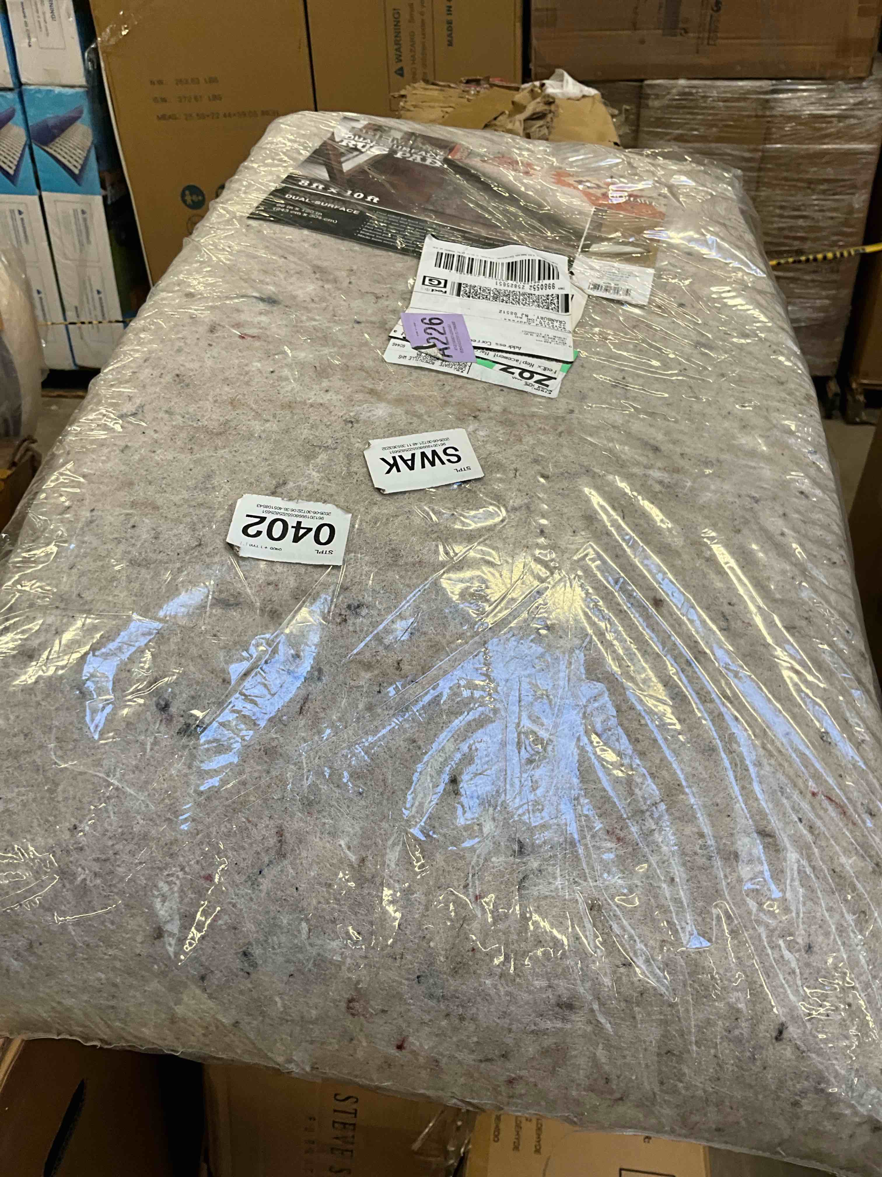 Condition photo showing New/Like New for mohawk home non slip rug pad 8' x 10' - 1/4" thick felt + latex rubber gripper - dual surface cushion for hardwood, carpet, tile floors, made in usa