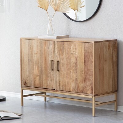 MH LONDON Nordic meets industrial here.Handmade by artisans from solid mango wood, this sideboard features stunning wood grain patterns.Check out those sleek powder coated metal
