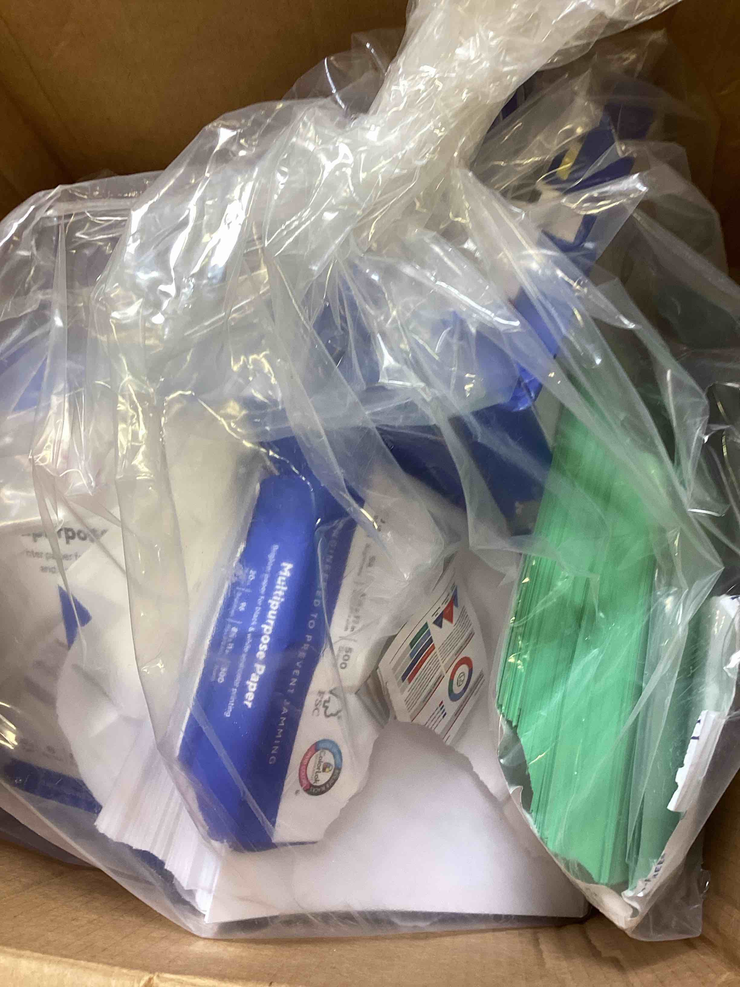 Condition photo showing As Is for assorted multipurpose paper 7-ream (white and green)