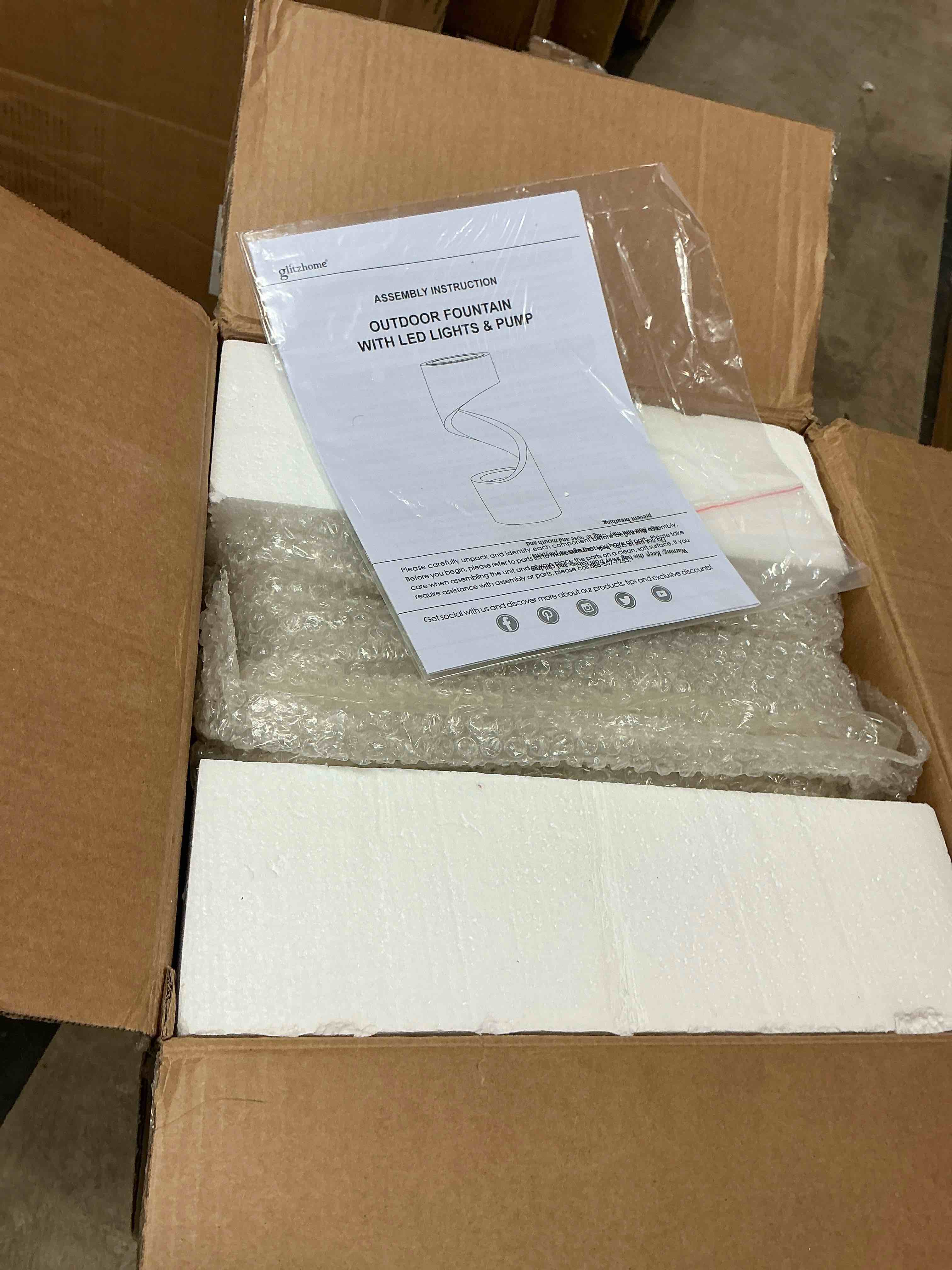 Condition photo showing Good Condition for glitzhome 31.25"h mid-century modern faux terrazzo spiral shaped polyresin outdoor fountain with pump and led (it has some dirt stains)