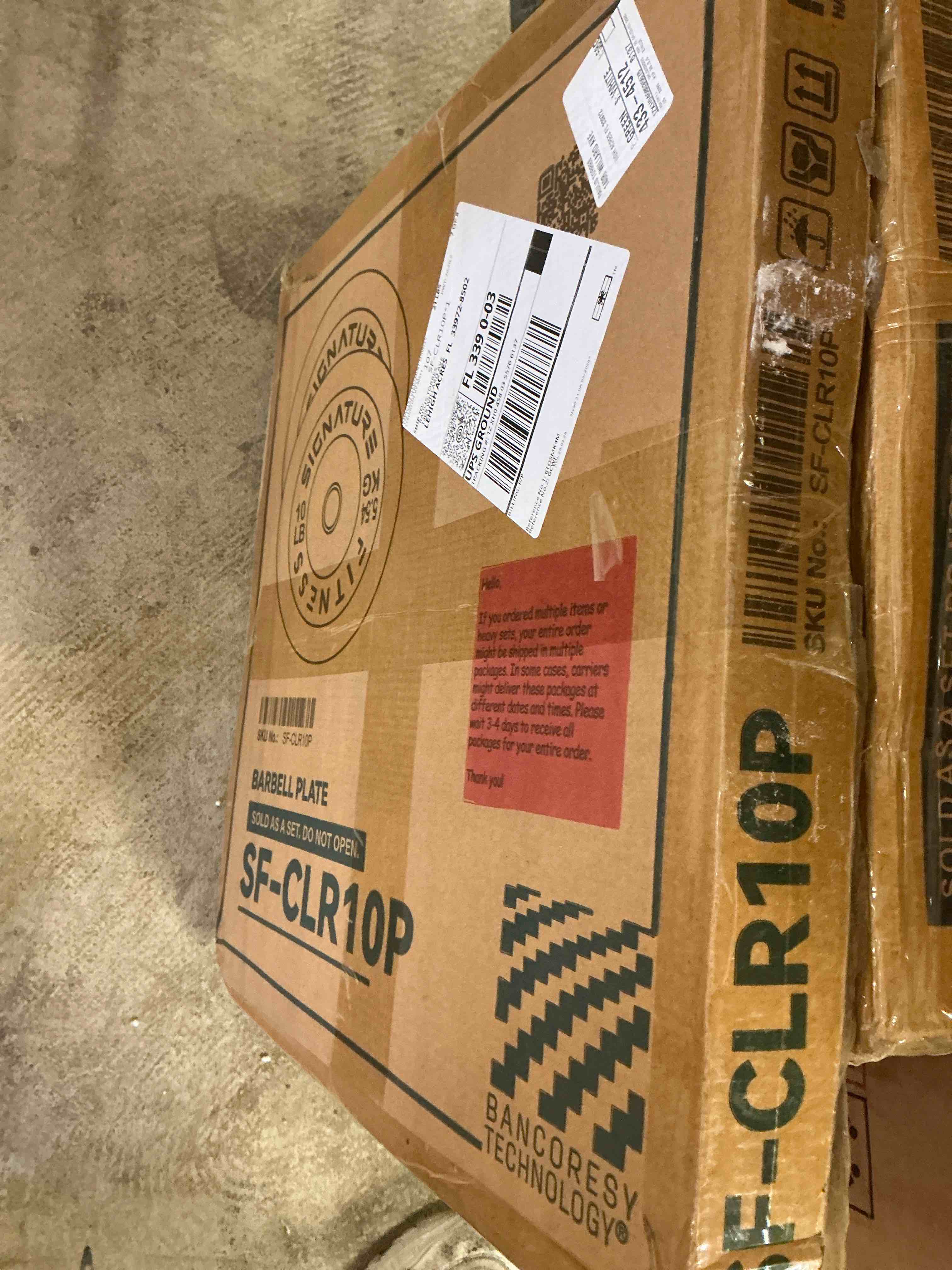 Condition photo showing Good Condition for signature fitness color coded 2" olympic bumper plate weight plates with steel hub - 100% virgin rubber, sf-clr10p