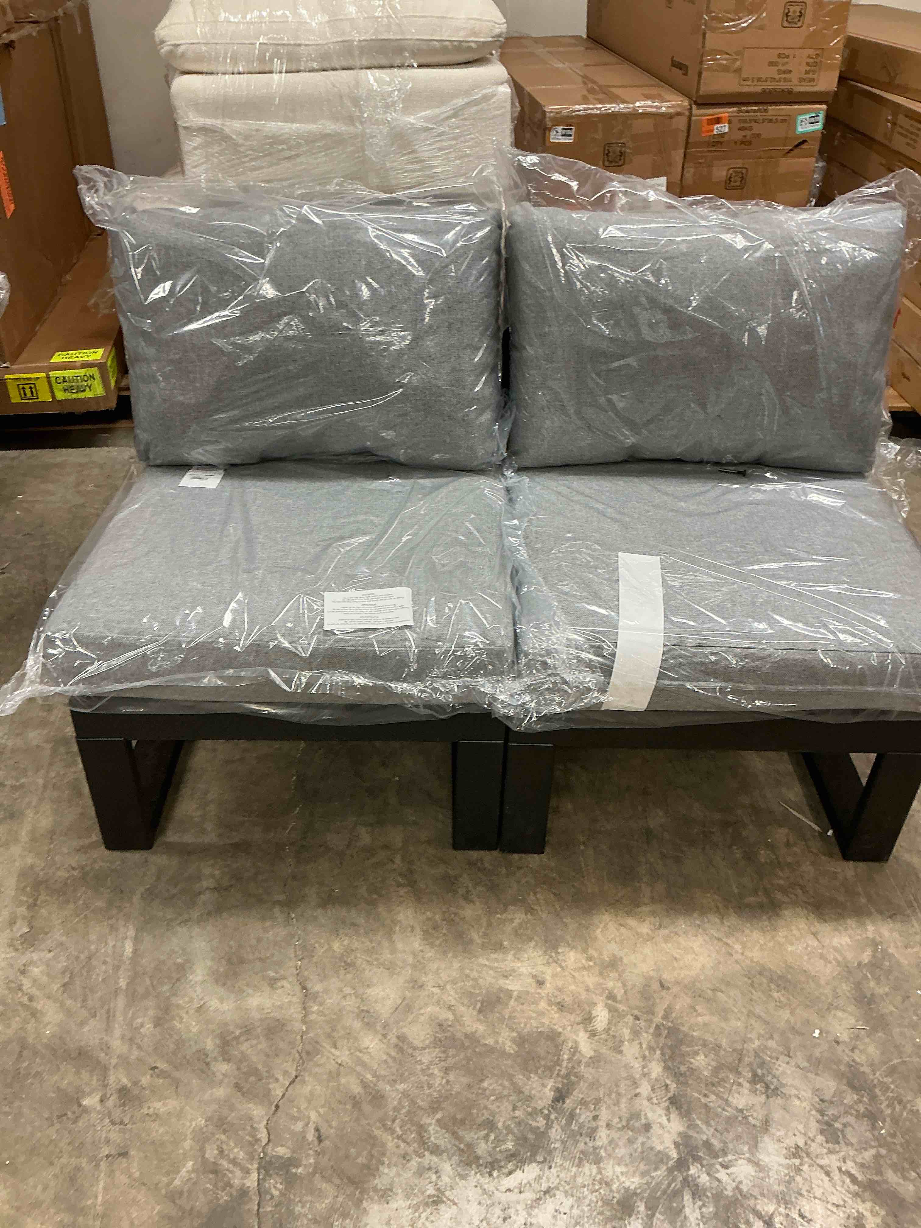 Condition photo showing New/Like New for leisuremod chelsea  set of 2 outdoor armless patio sectional black aluminum with beige cushions (pick up 4 boxes)
