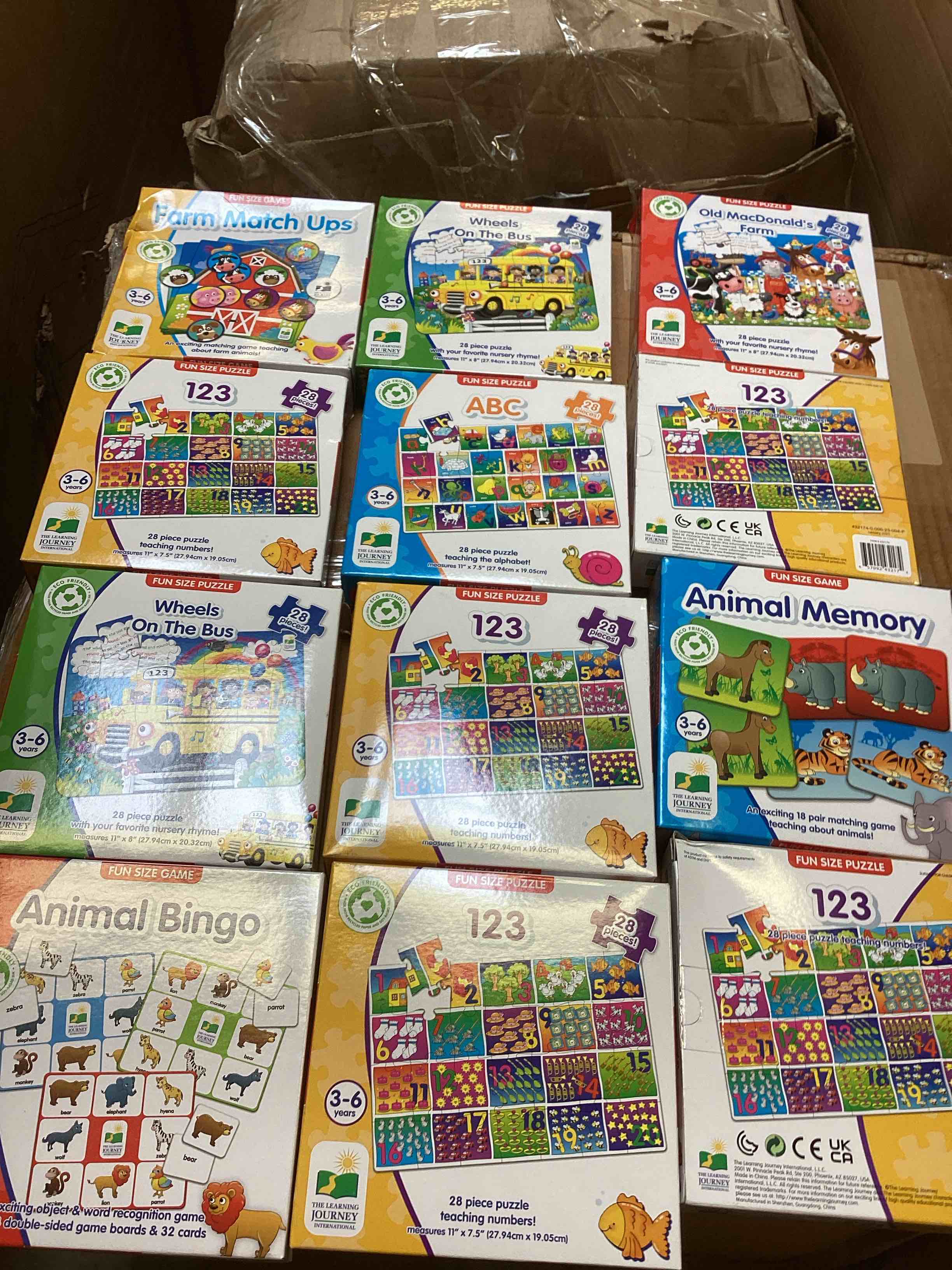 Condition photo showing New/Like New for assorted puzzle games 