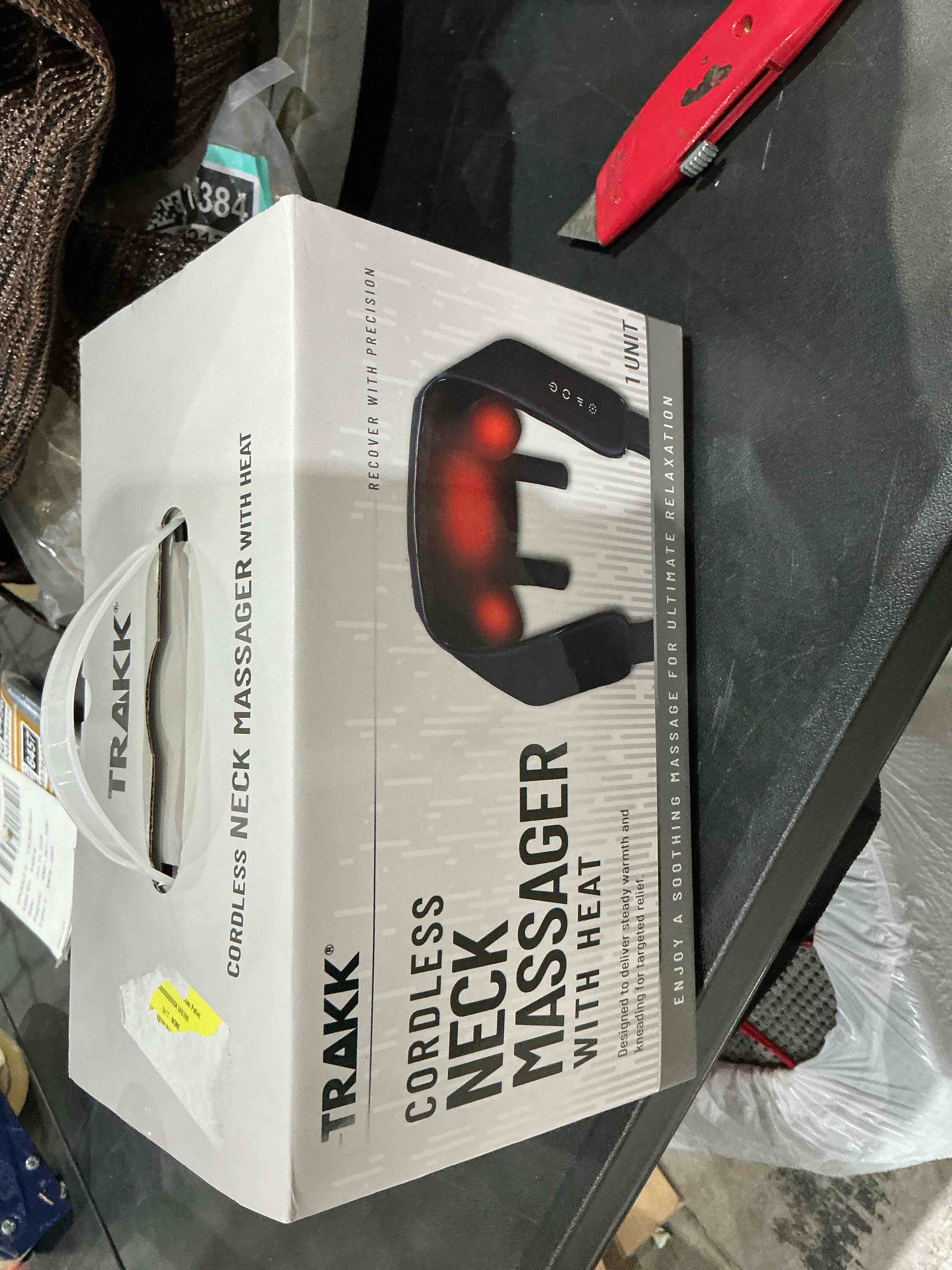 Condition photo showing As Is for trakk cordless neck massager with heat