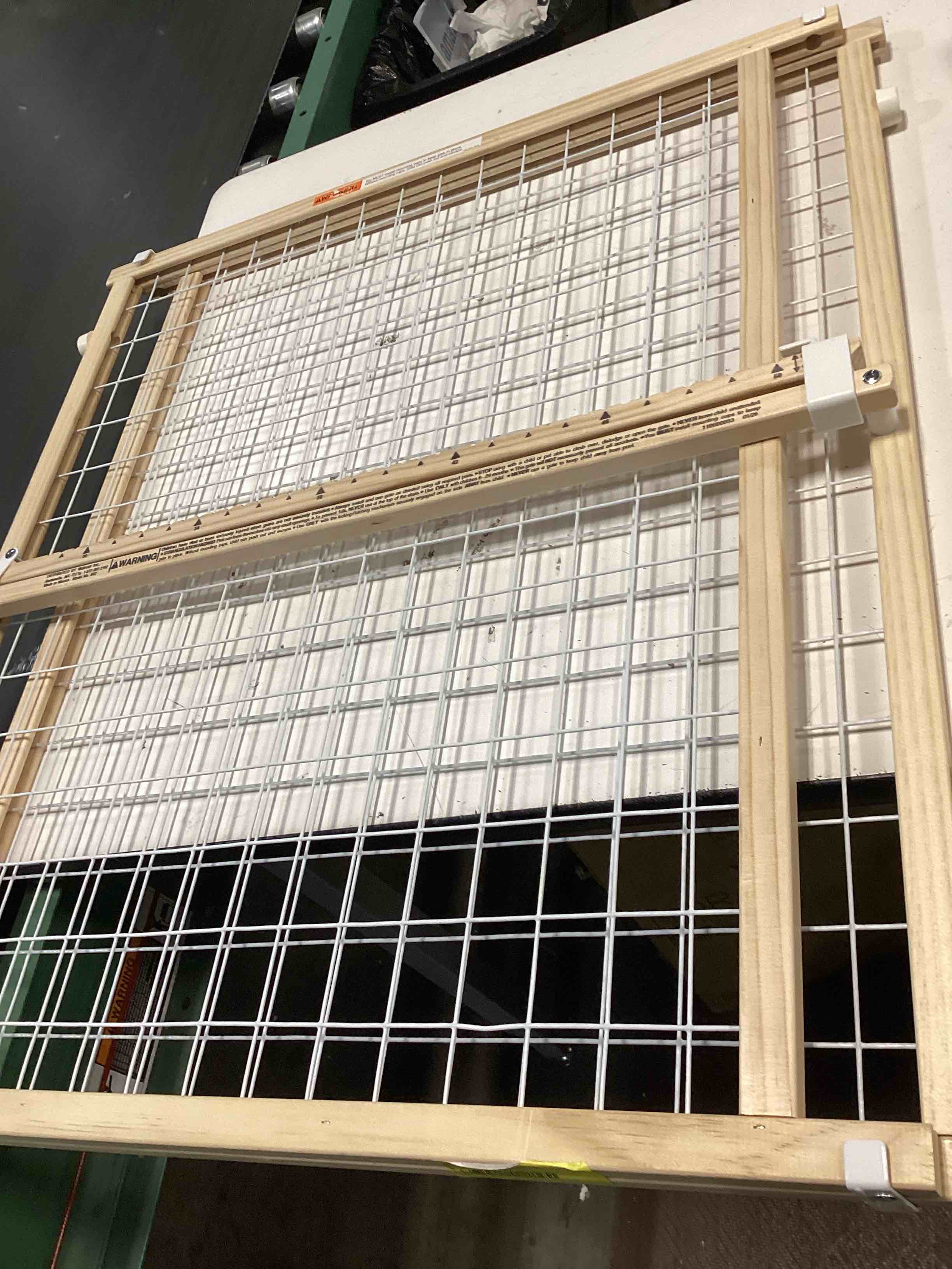 Condition photo showing As Is for toddleroo by north states - extra-wide wire mesh wooden baby gate: pressure mounted baby gate for doorways - adjustable 29.5 to 50 inches wide - 31 inches tall