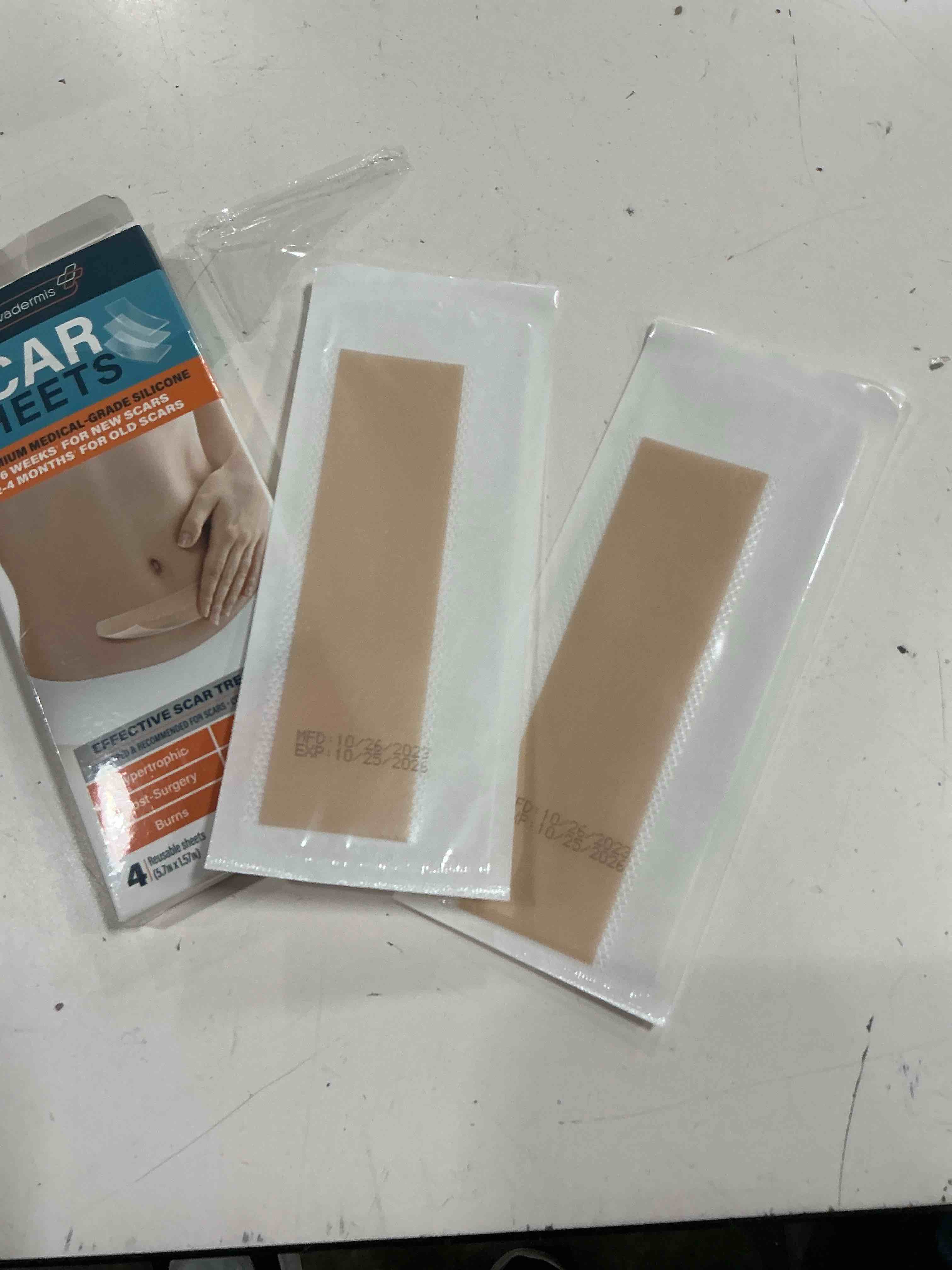 Condition photo showing As Is for nuvadermis silicone scar sheets, tape, strips - usa tested - healing keloid, c-section, tummy tuck - as surgical cream, gel, patch, bandage, pad - surgery scars treatment - 4 pack 5.7"x1.57" (missing 2 sheets)