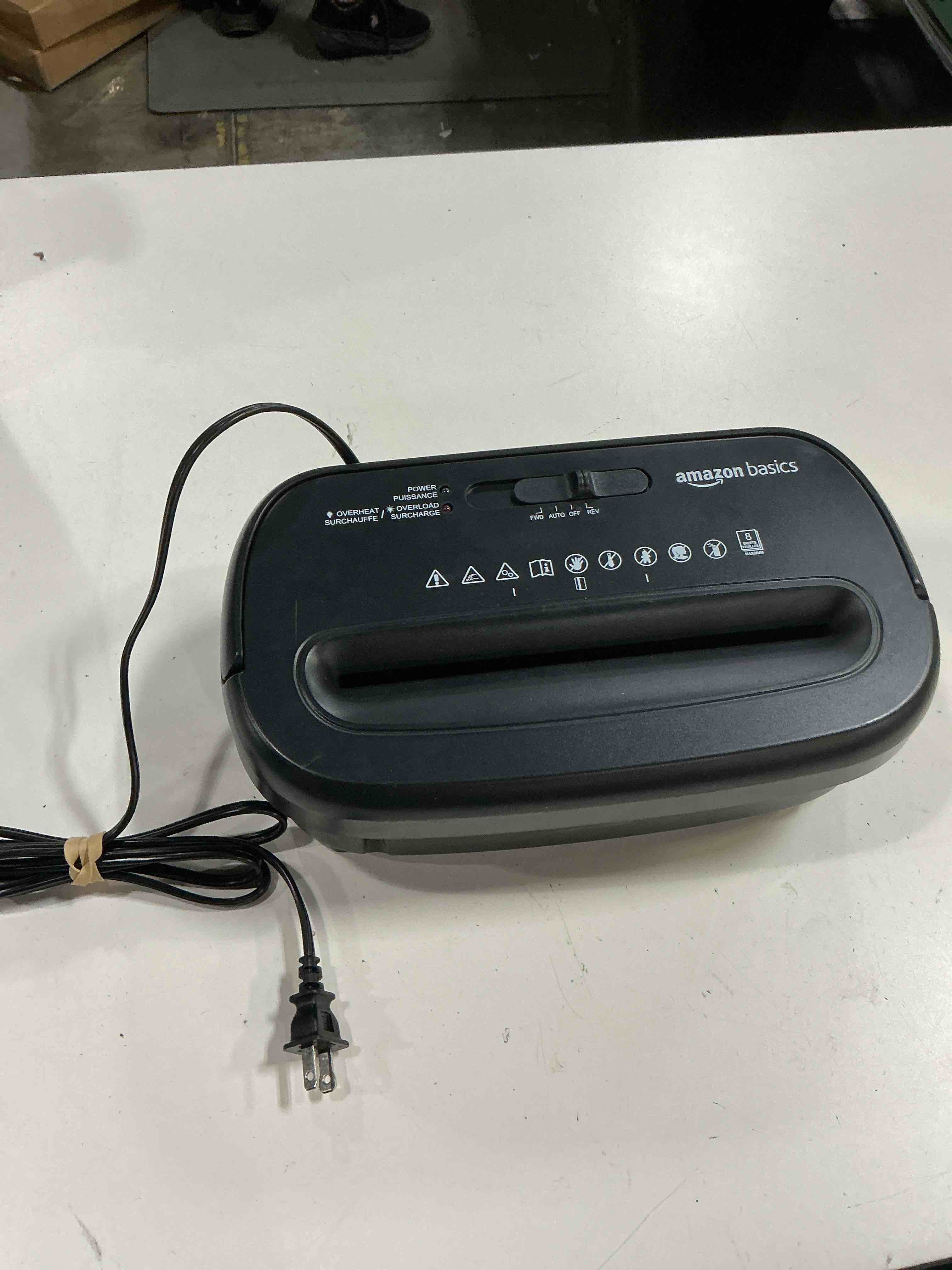 Condition photo showing As Is for amazon basics 8-sheet cross-cut paper and credit card shredder (missing can)