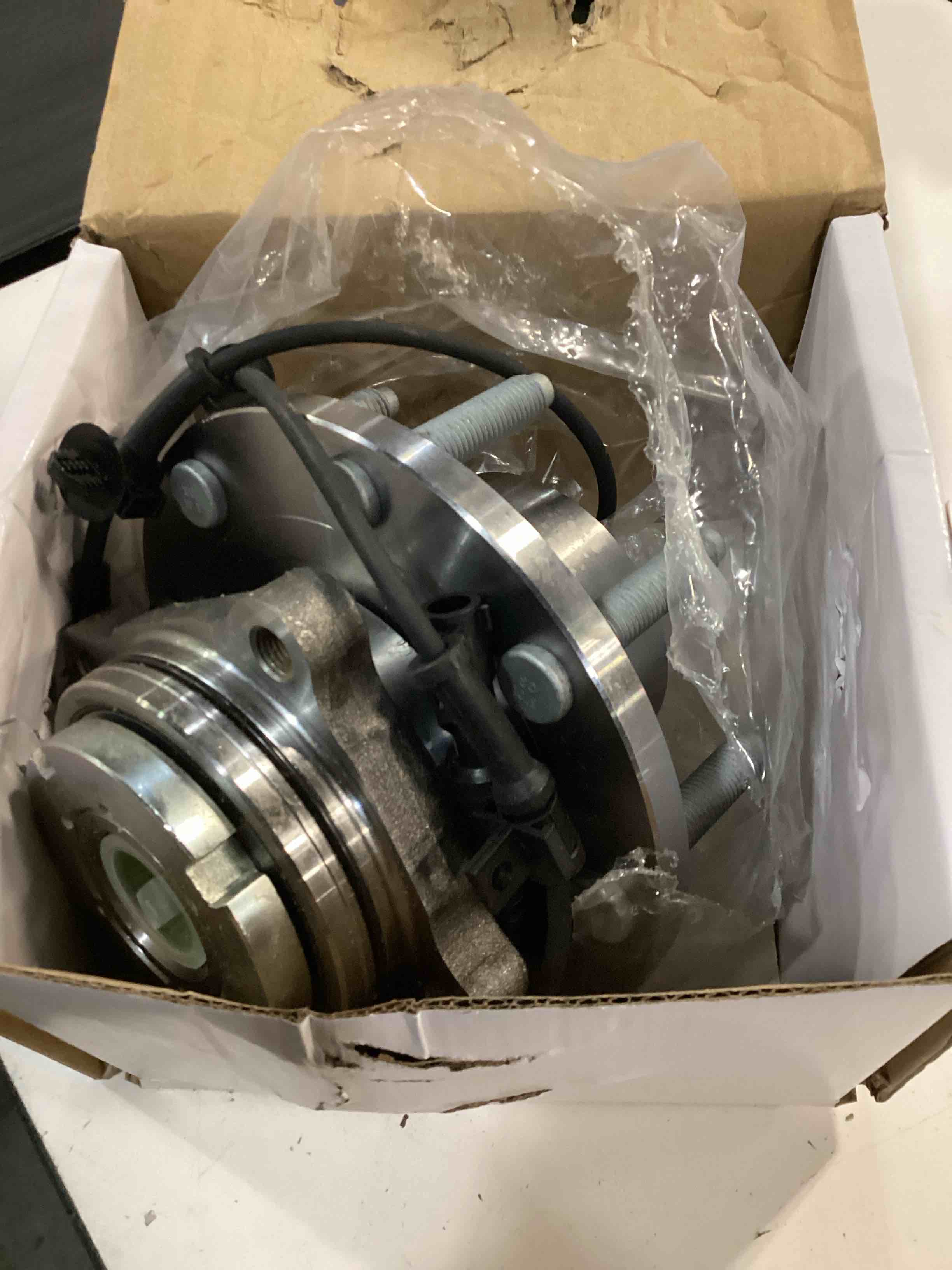 Condition photo showing As Is for dorman 951-059 front wheel bearing and hub assembly compatible with select ford models