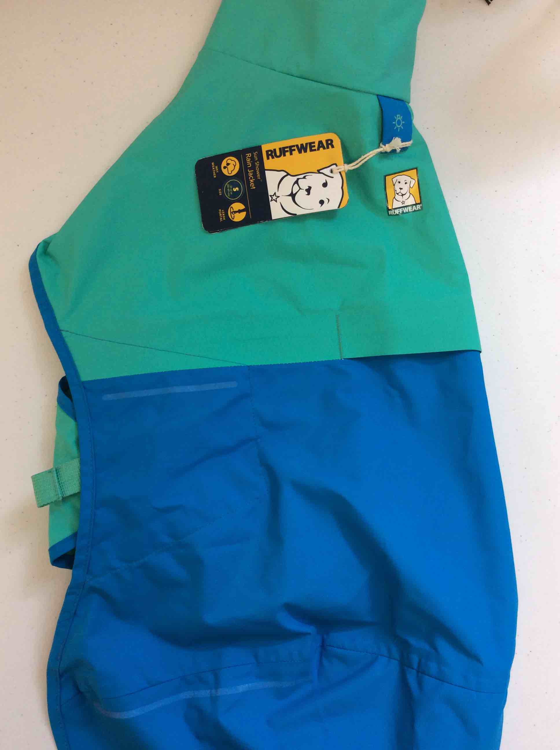 Condition photo showing New/Like New for ruffwear, sun shower dog raincoat, waterproof & windproof jacket for wet weather