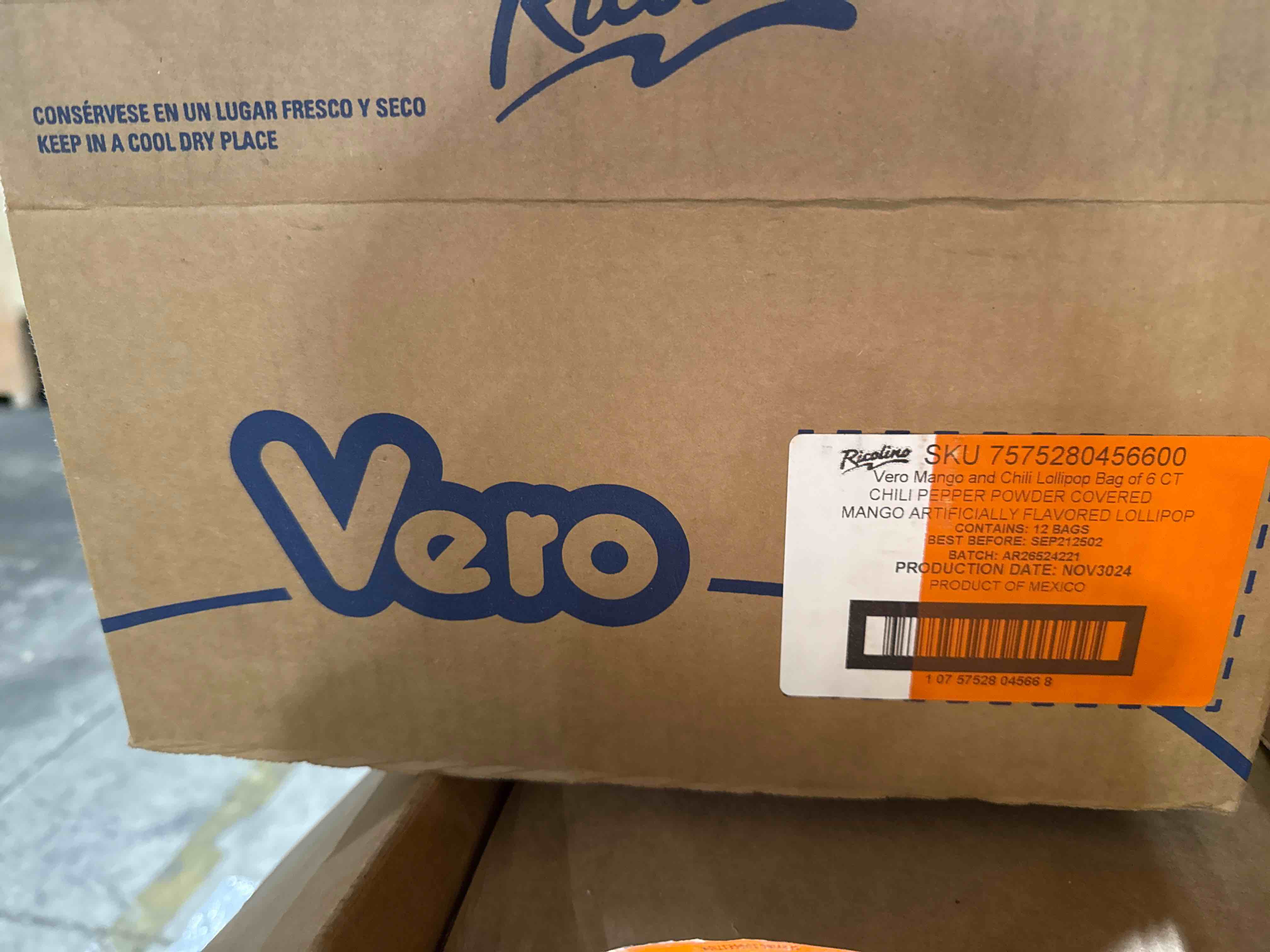 Condition photo showing Brand New for case of 12 vero mango lollipops coated with chili powder, hot and sweet candy treat, artificially flavored, net wt. 2.96 ounces, bbsept 25