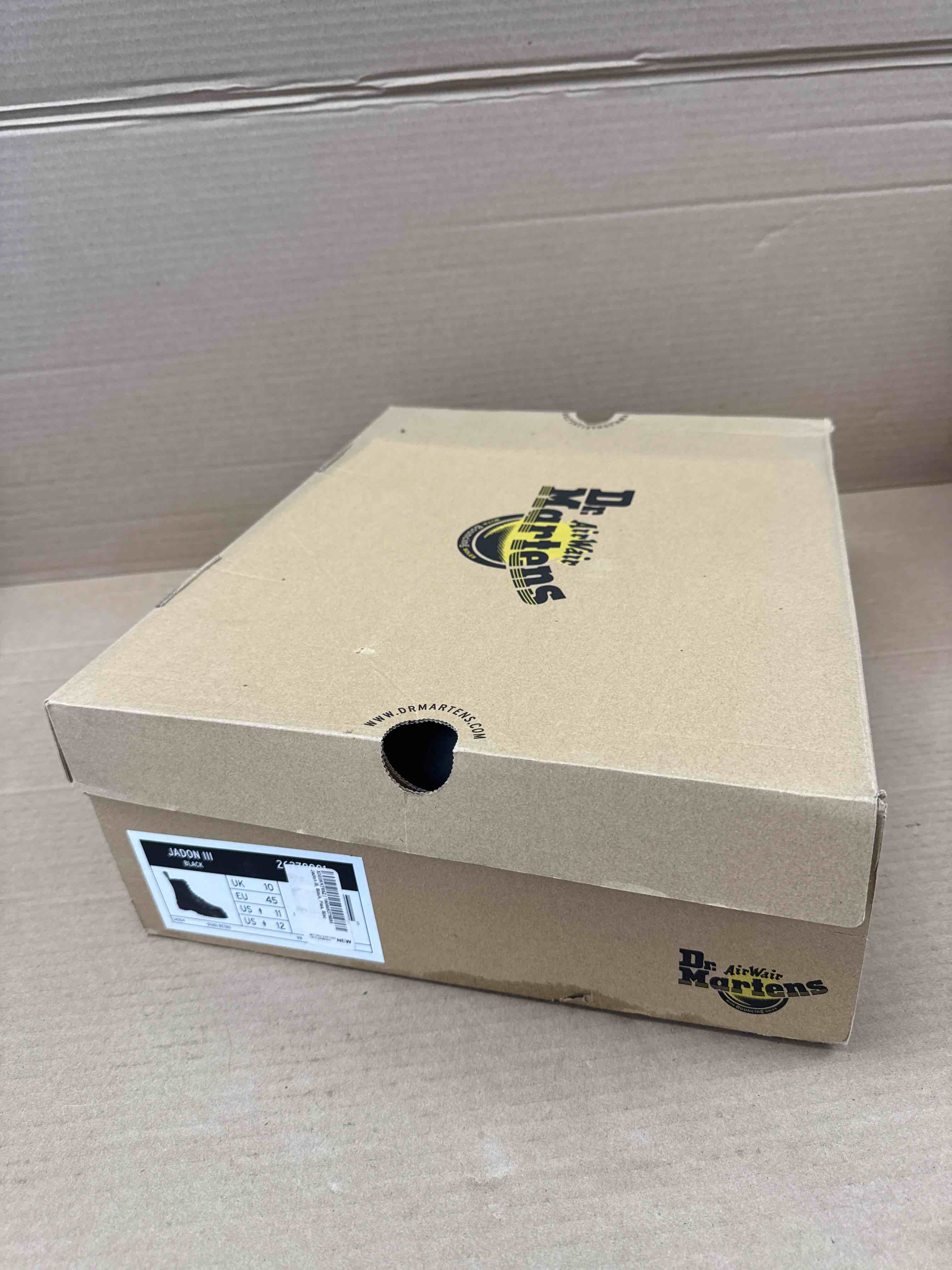 Condition photo showing New/Like New for women’s 12 men’s 11 dr. martens jadon boot - black