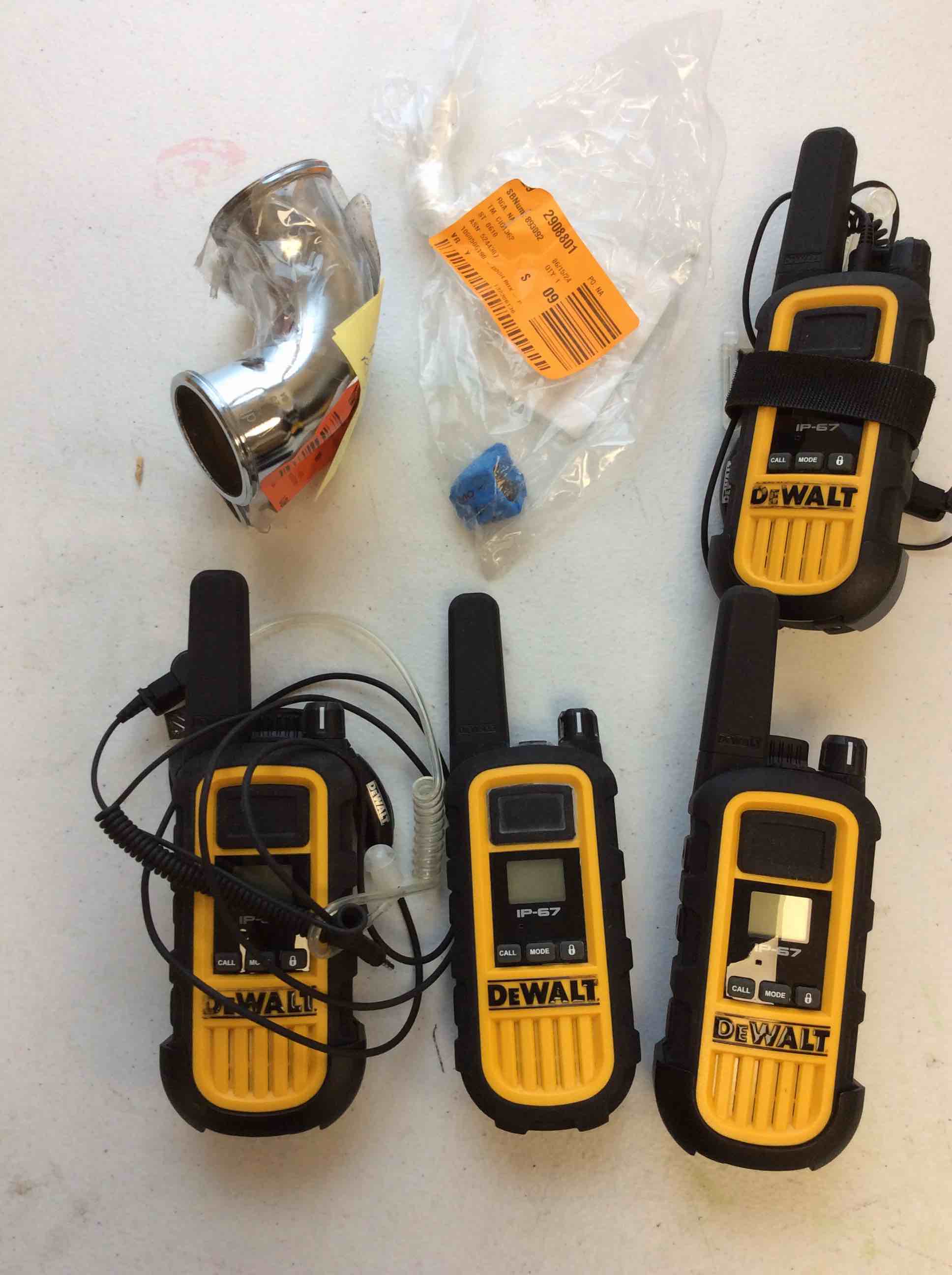 Four DeWalt Heavy-Duty 2 Way Radios and Pipes