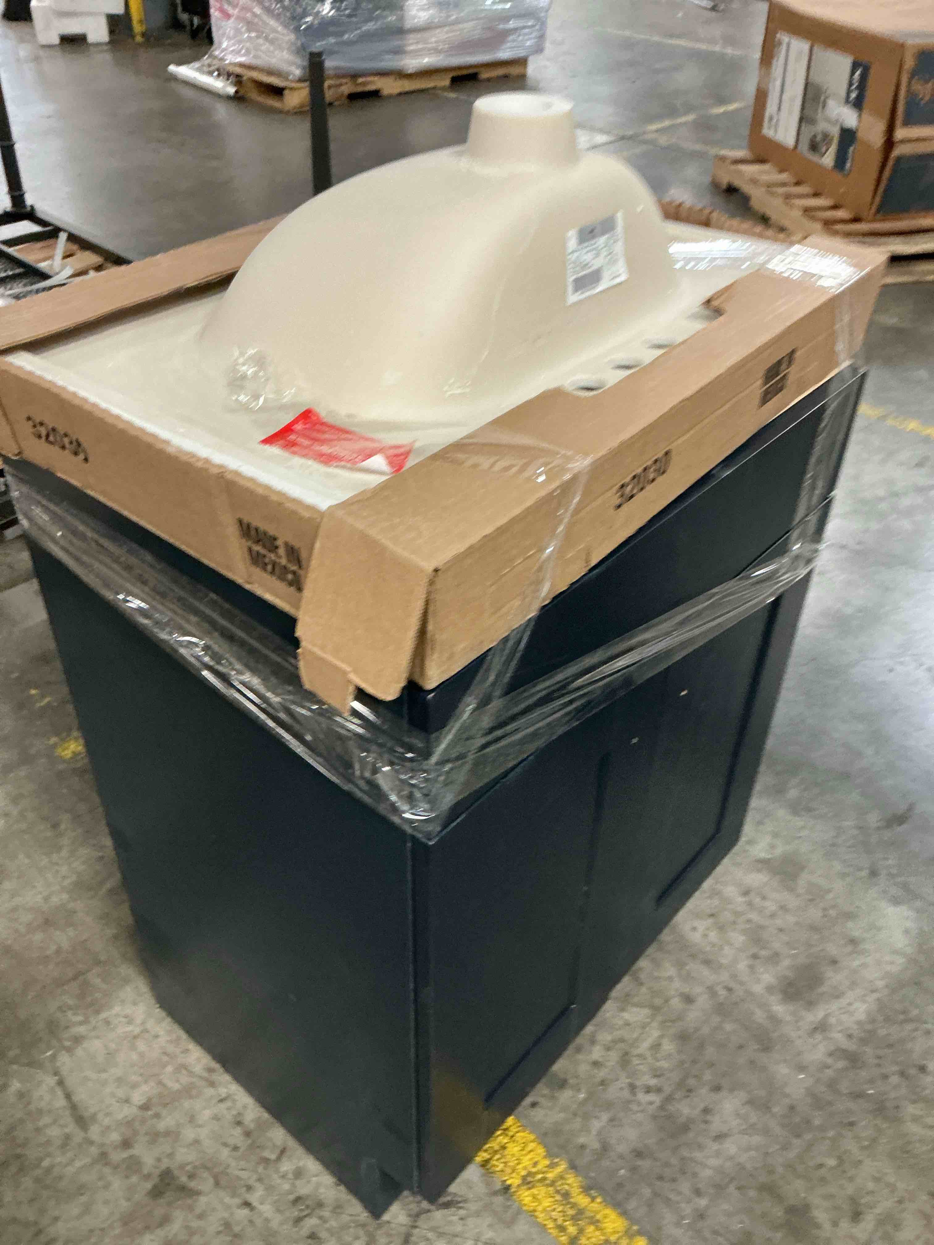 Condition photo showing As Is for  project source dover 24-in navy blue single sink bathroom vanity with white cultured marble top