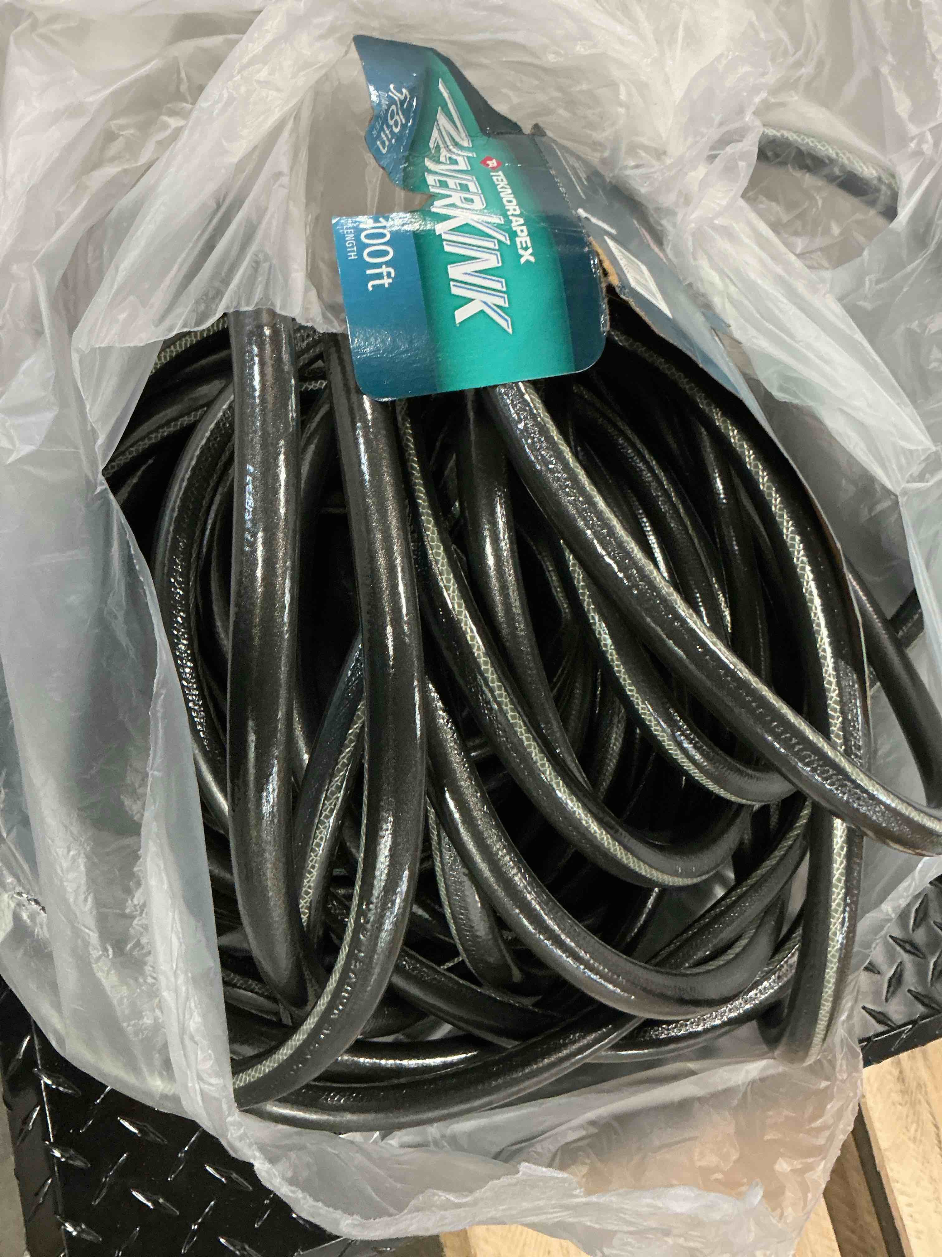 Condition photo showing As Is for neverkink teknor apex 5/8-in x 100-ft heavy -duty kink free vinyl gray coiled hose