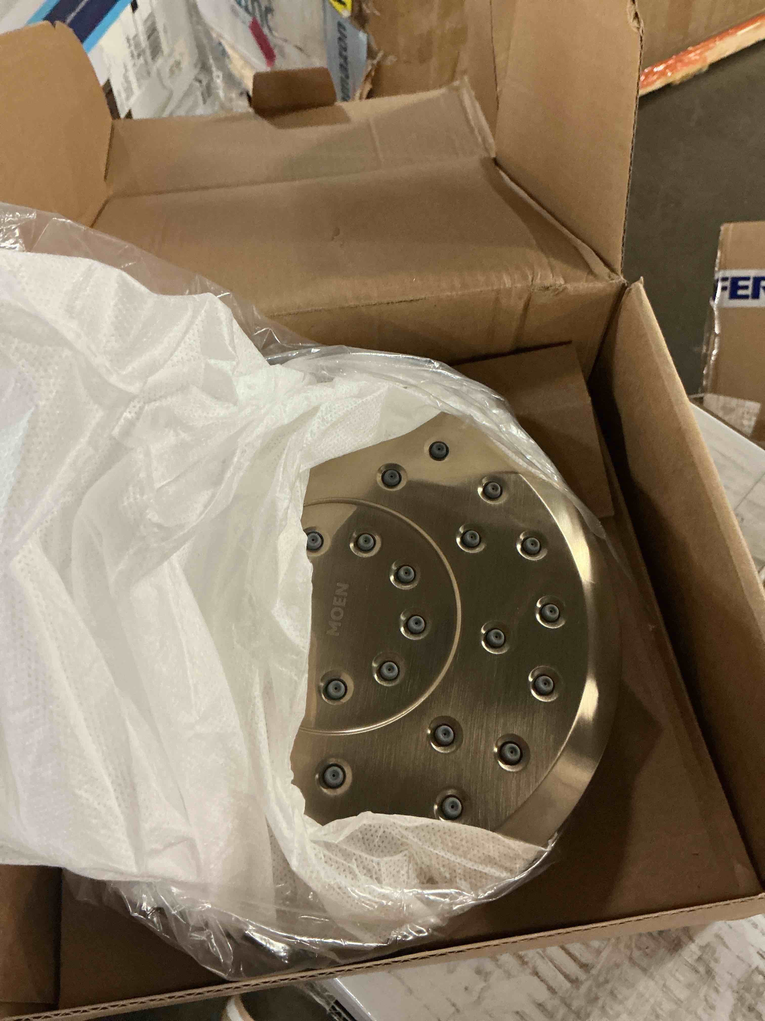 Condition photo showing Good Condition for moen verso eight function 6" diameter spray head rainshower, 2.5 gpm - bronzed gold