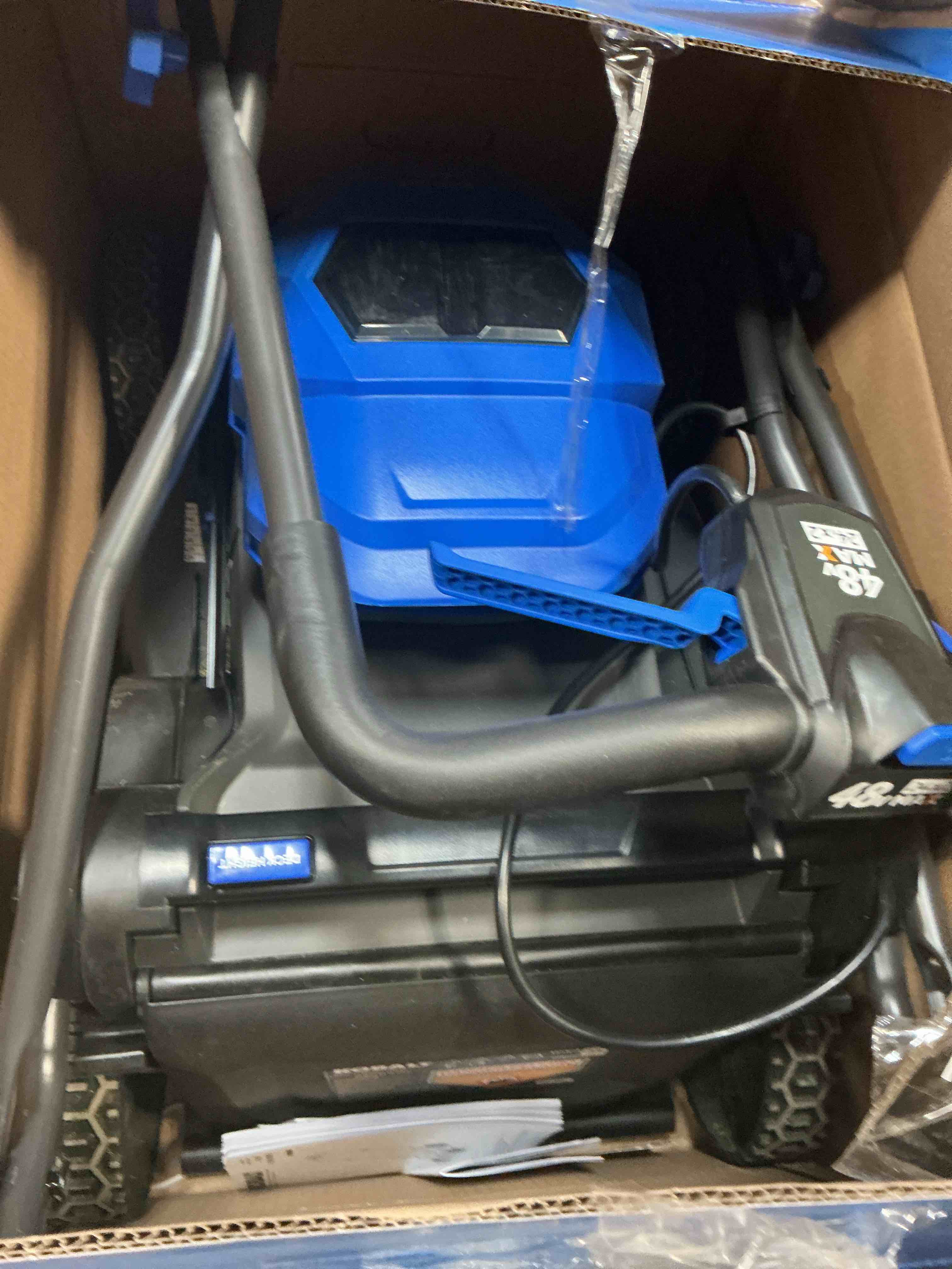 Condition photo showing As Is for kobalt 48v max (24vx2) 17-in push mower kit, (2) 4.0ah batteries