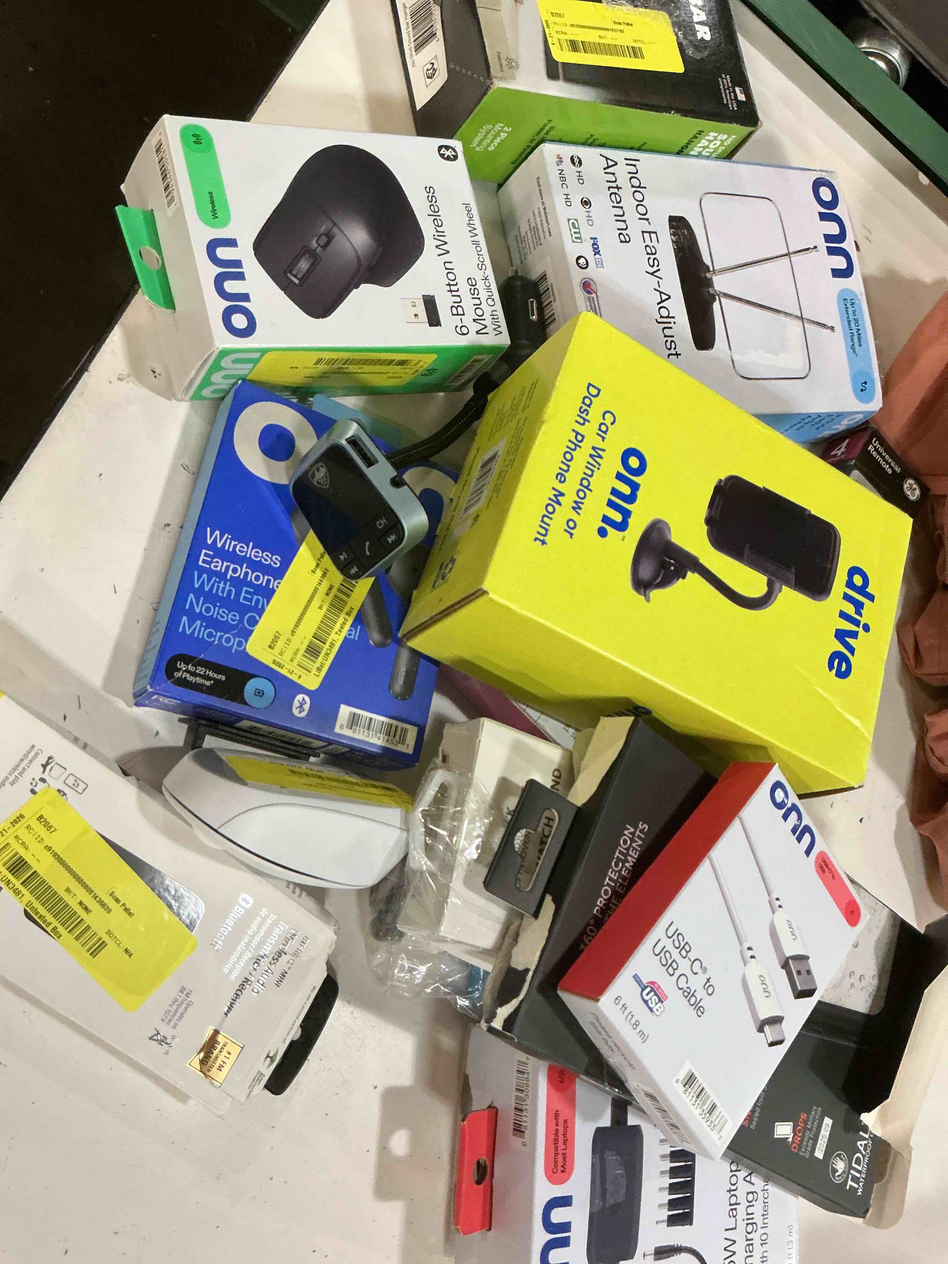 Condition photo showing As Is for assorted lot of electronics (headphones, small gadgets, headsets, etc.)