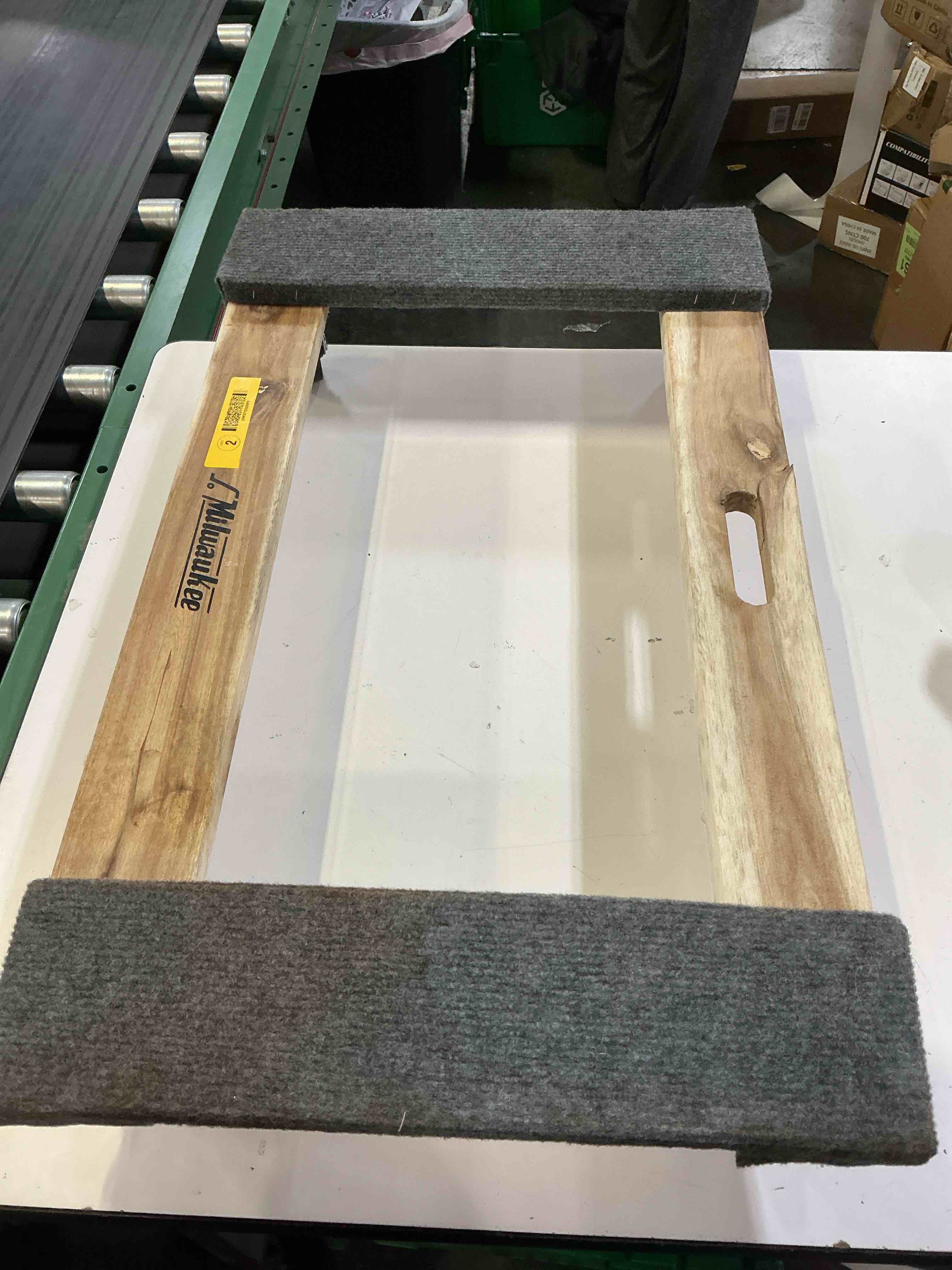 Condition photo showing As Is for milwaukee wood dolly