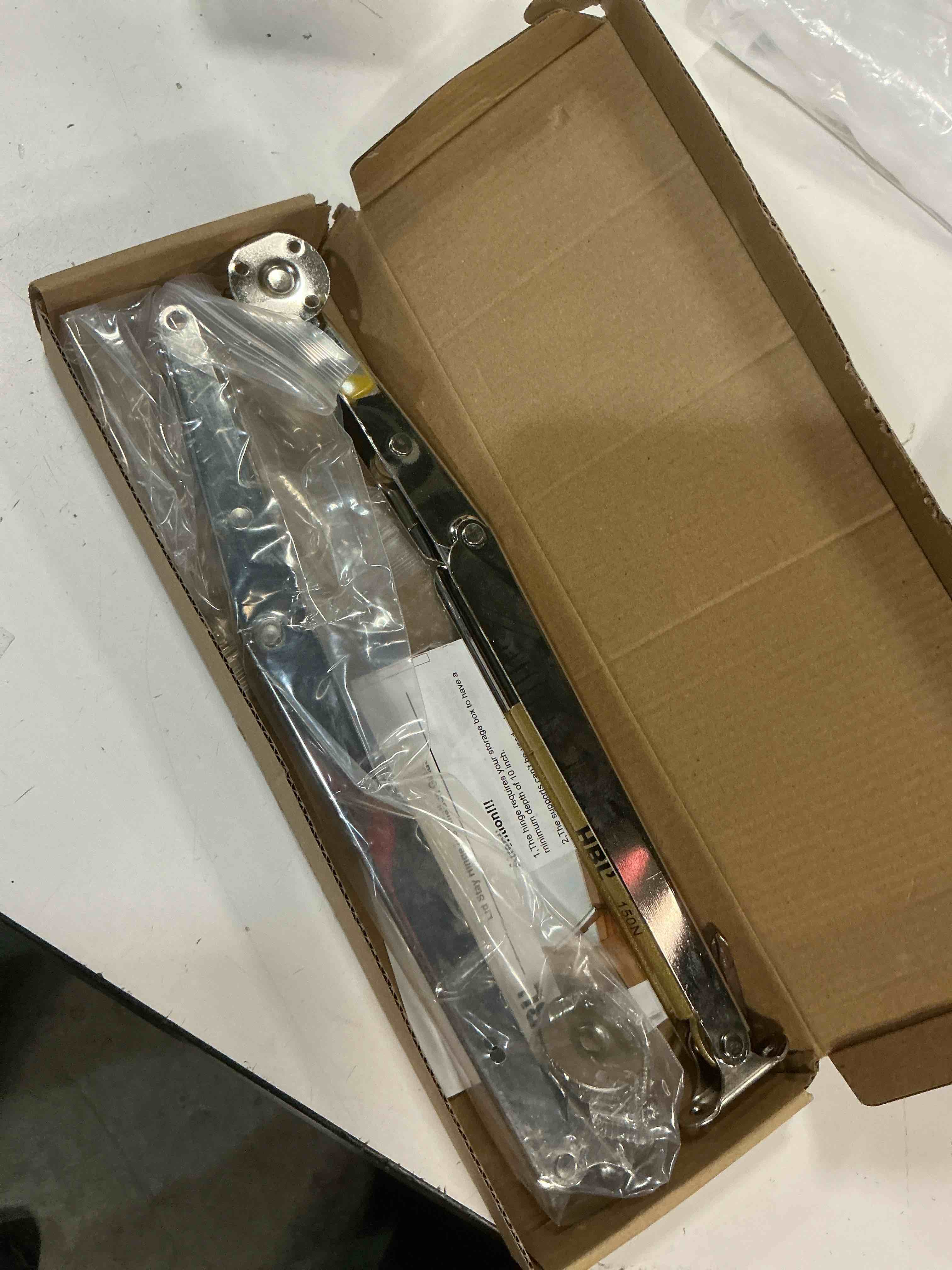 Condition photo showing As Is for 2 pack | 150n gas strut spring hinges for heavy lids to keep stay, slow down and soft close, hydraulic hinges for toy box chest, bench, toolbox and basement floor door.