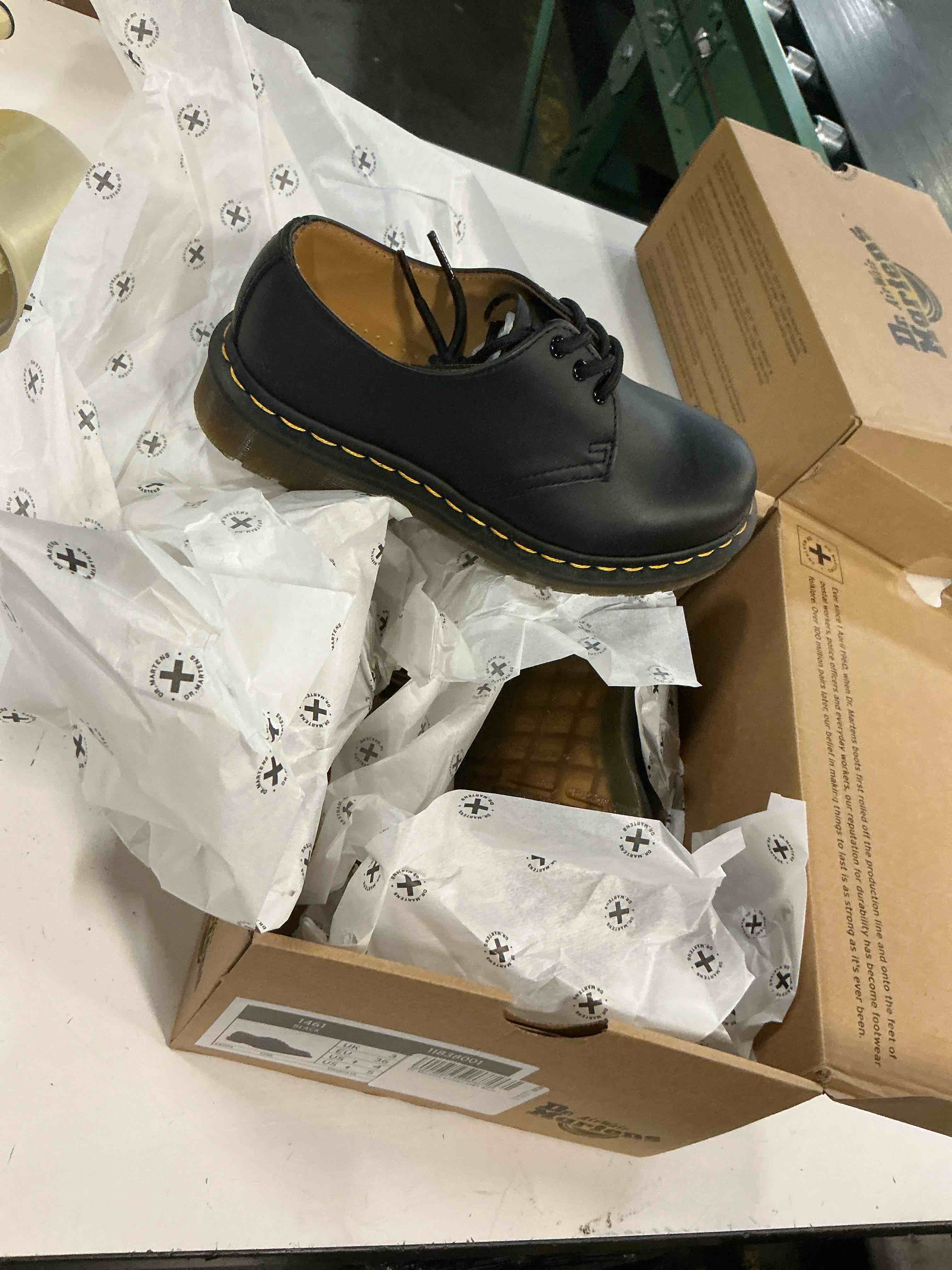 Condition photo showing New/Like New for dr. martens womens 1461 slip resistant oxford shoes size 4