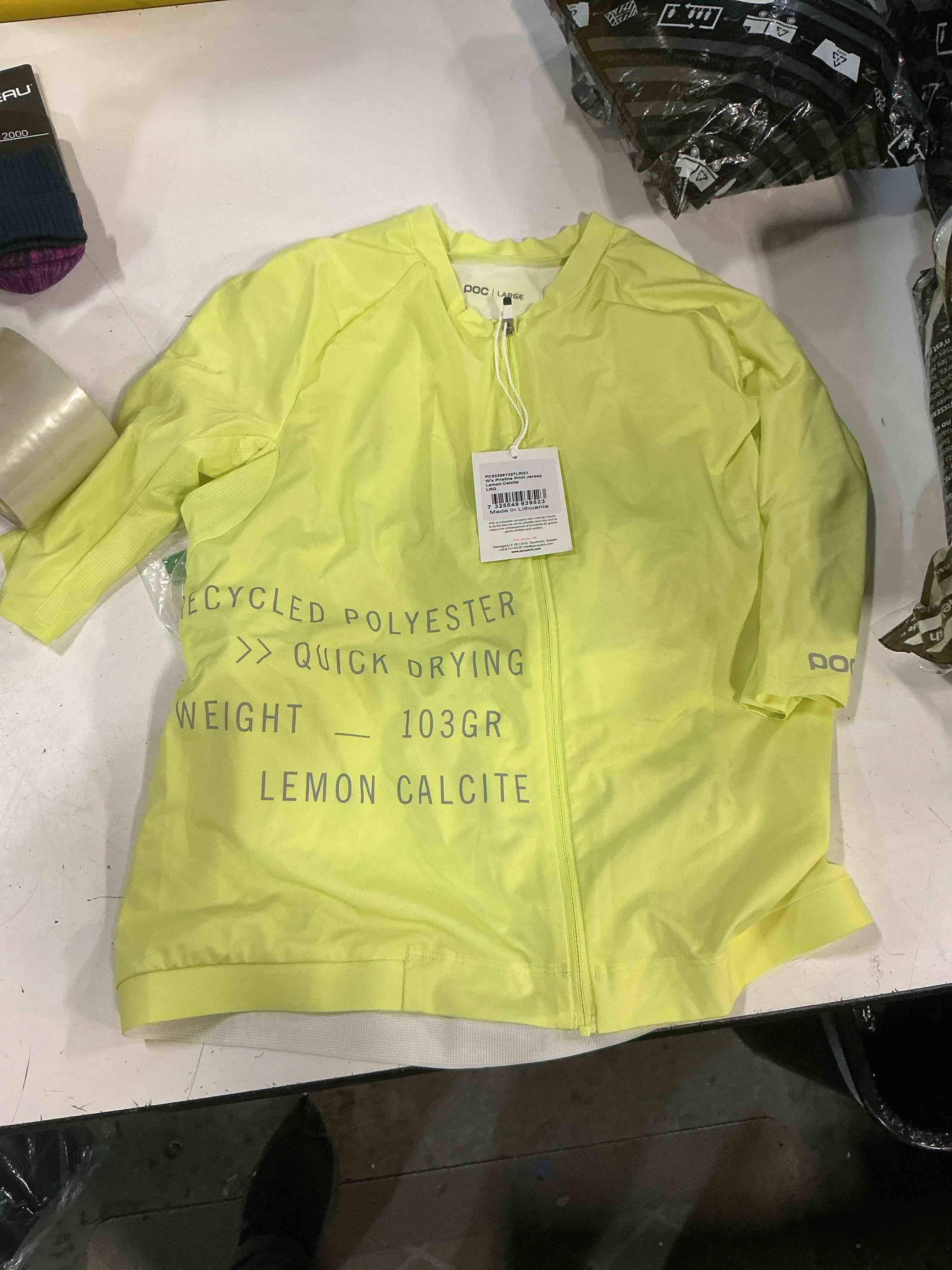 Condition photo showing New/Like New for women's pristine print cycling jersey size l
