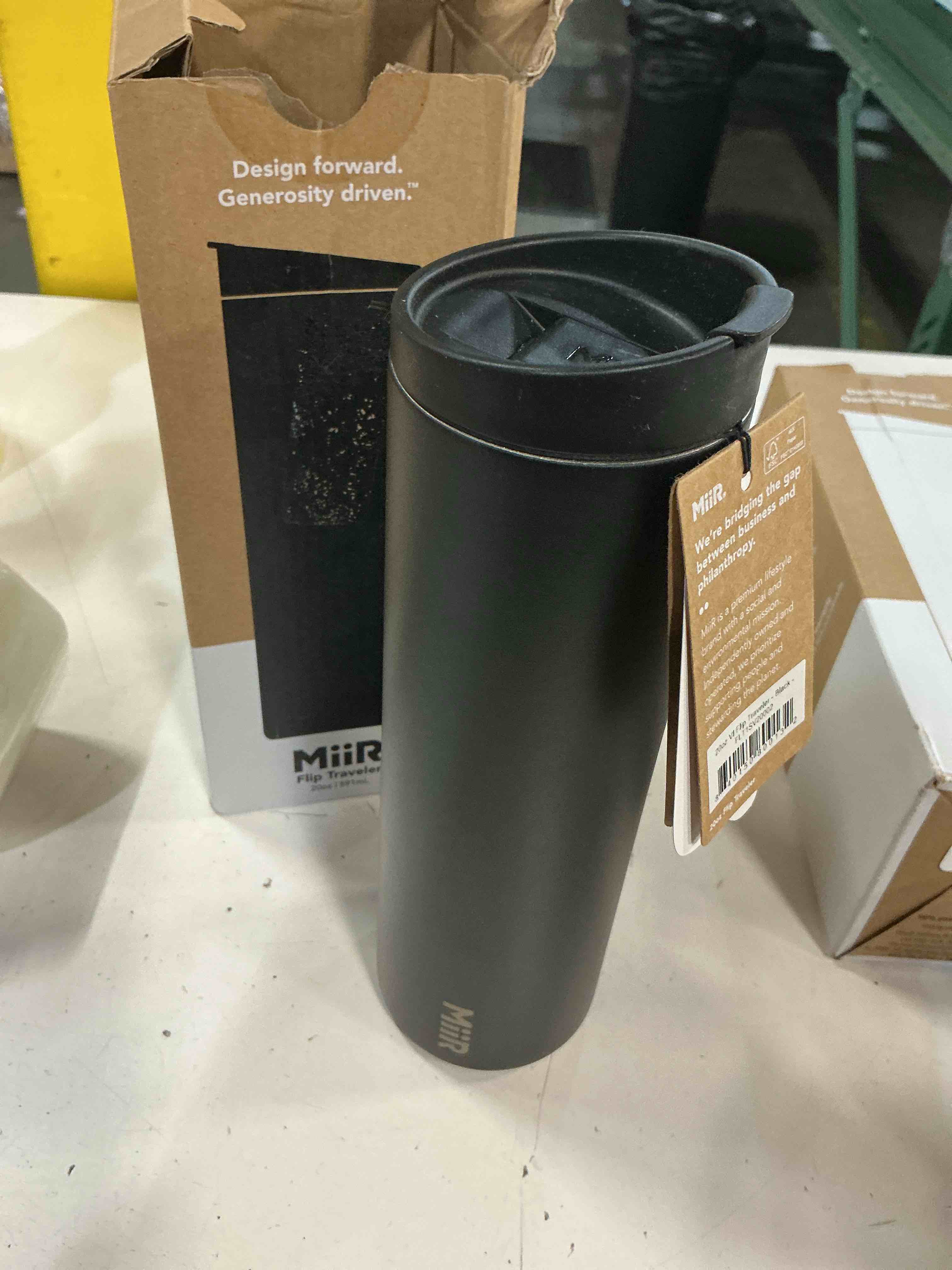Condition photo showing New/Like New for miir flip traveler 20oz - double-wall vacuum insulated with flip lid, bpa-free stainless steel construction, insulated tumbler for hot or cold drinks