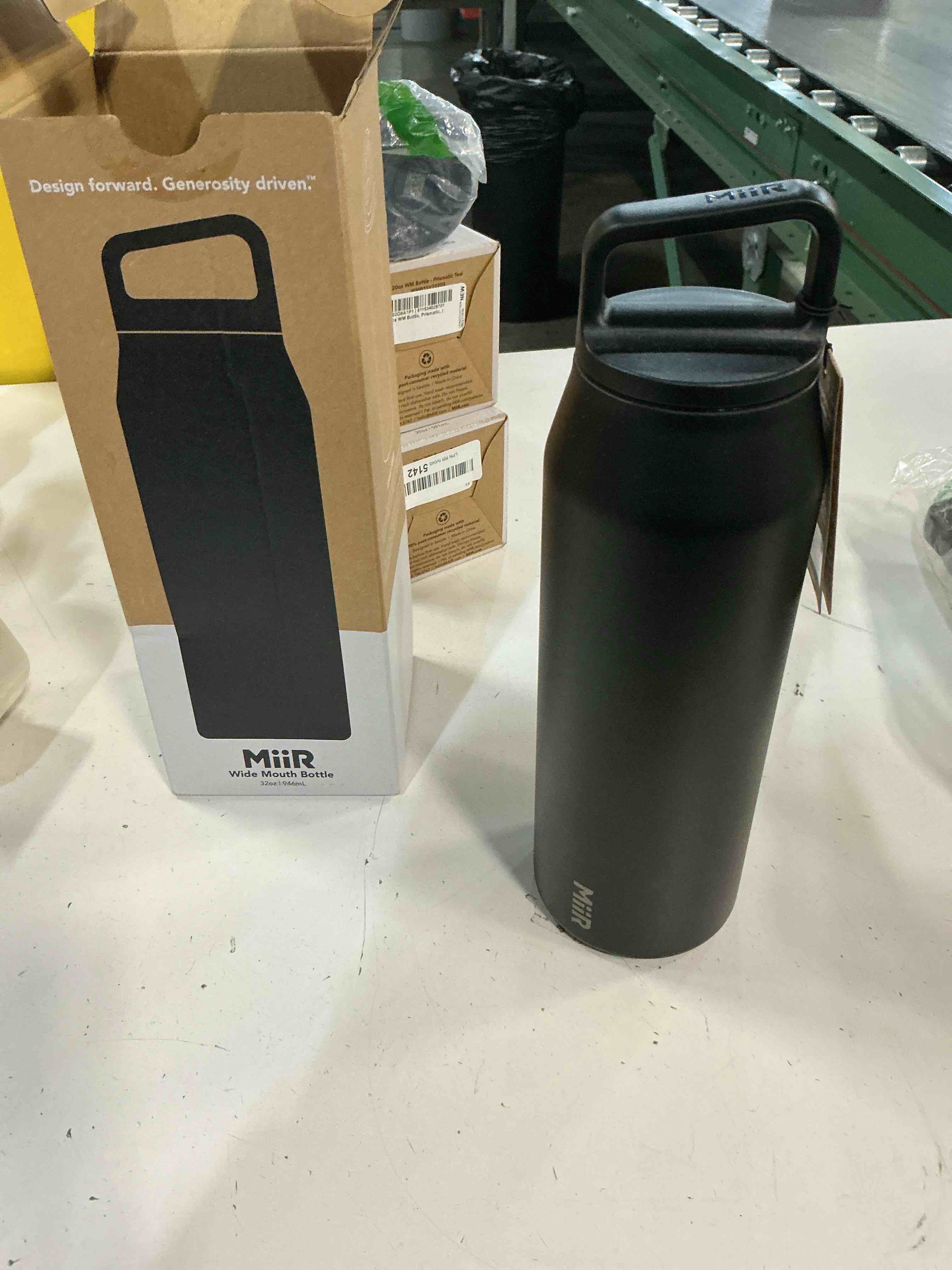 Condition photo showing New/Like New for miir, wide mouth water bottle, vacuum insulated, leakproof, stainless steel construction, basal, 32 oz