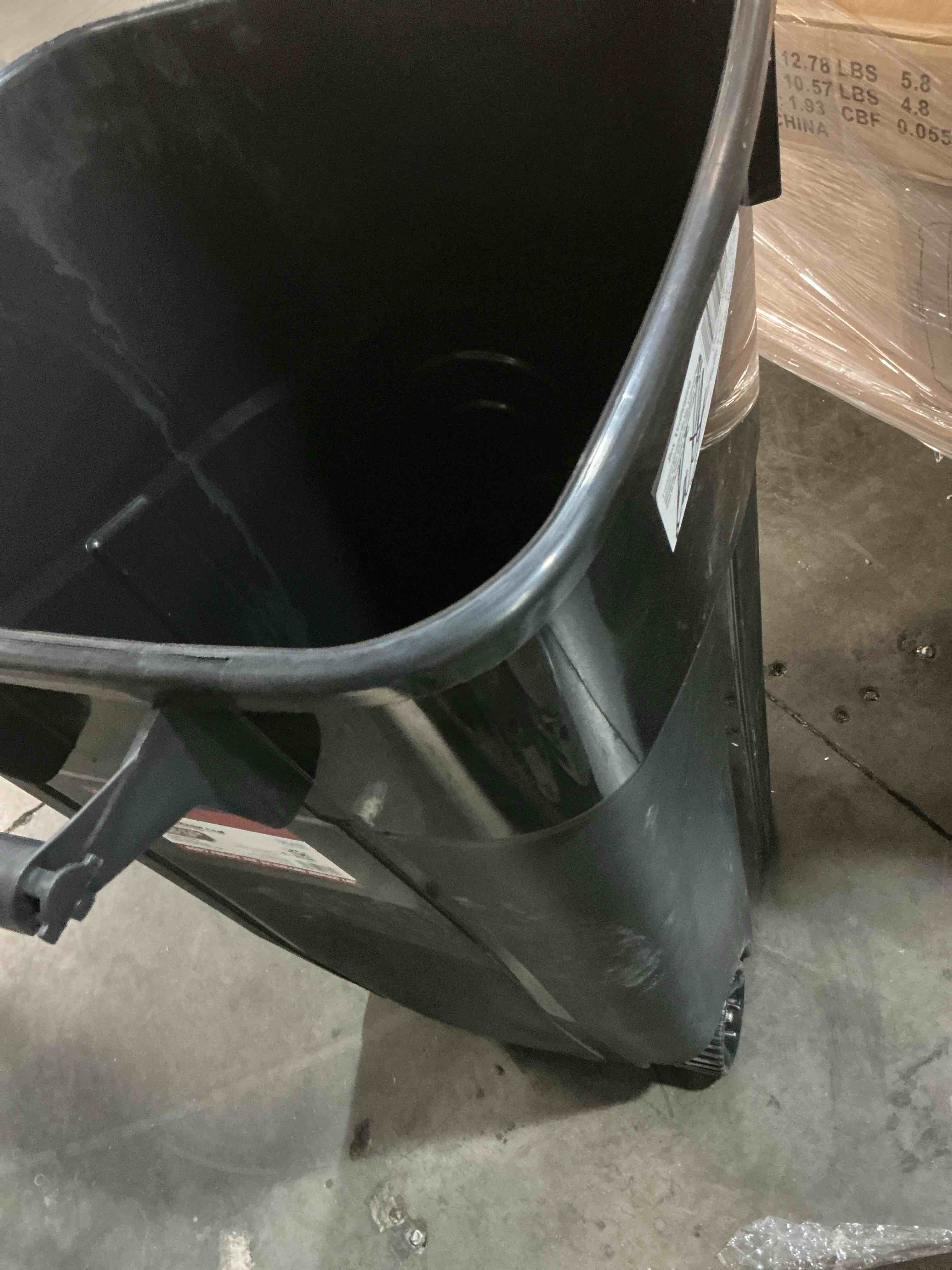 Condition photo showing Good Condition for united solutions 32 gallon outdoor waste garbage bin with attached lid, heavy-duty handles, snap lock , wheeled trashcan, black